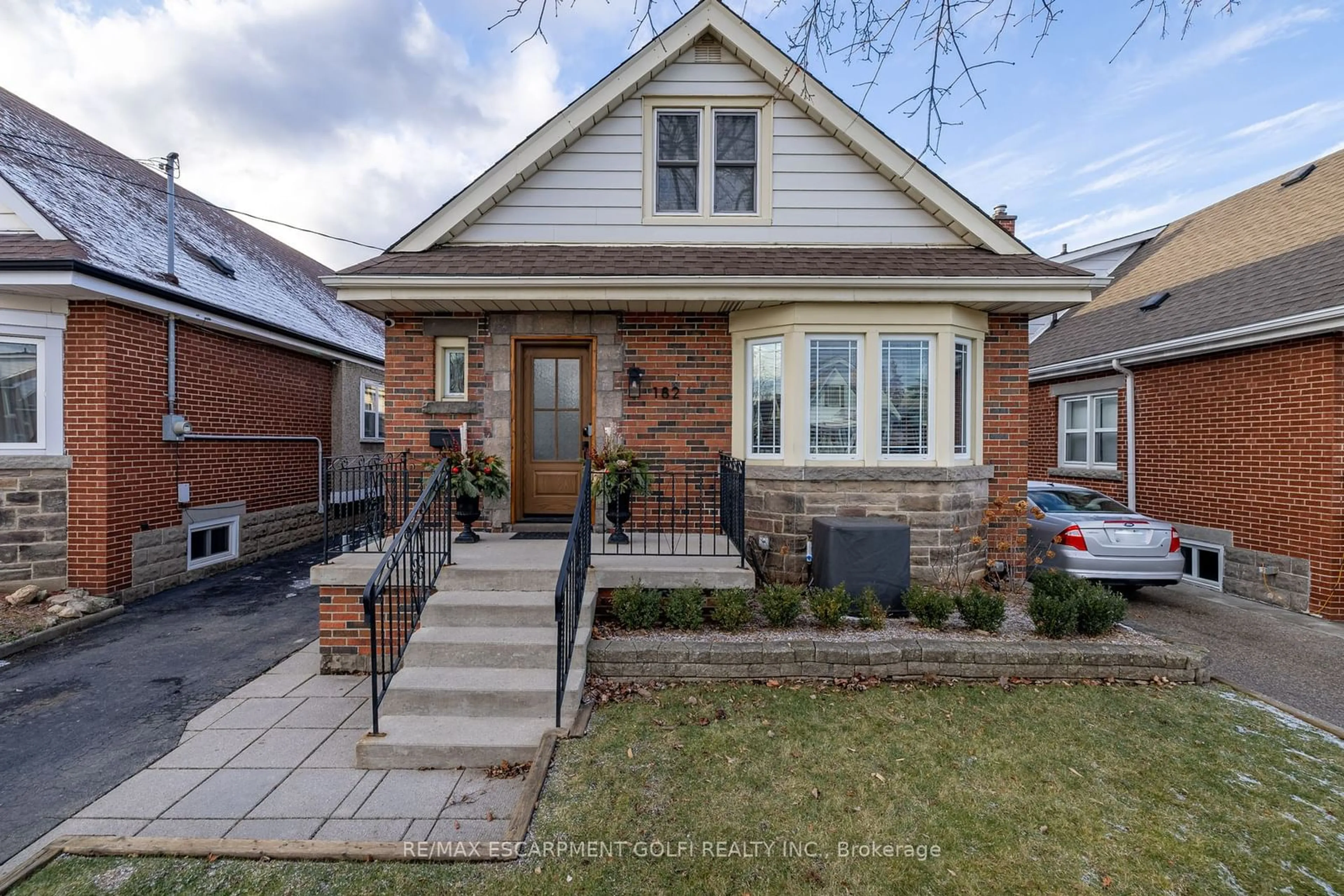 Home with brick exterior material, street for 182 Huxley Ave, Hamilton Ontario L8K 2R3