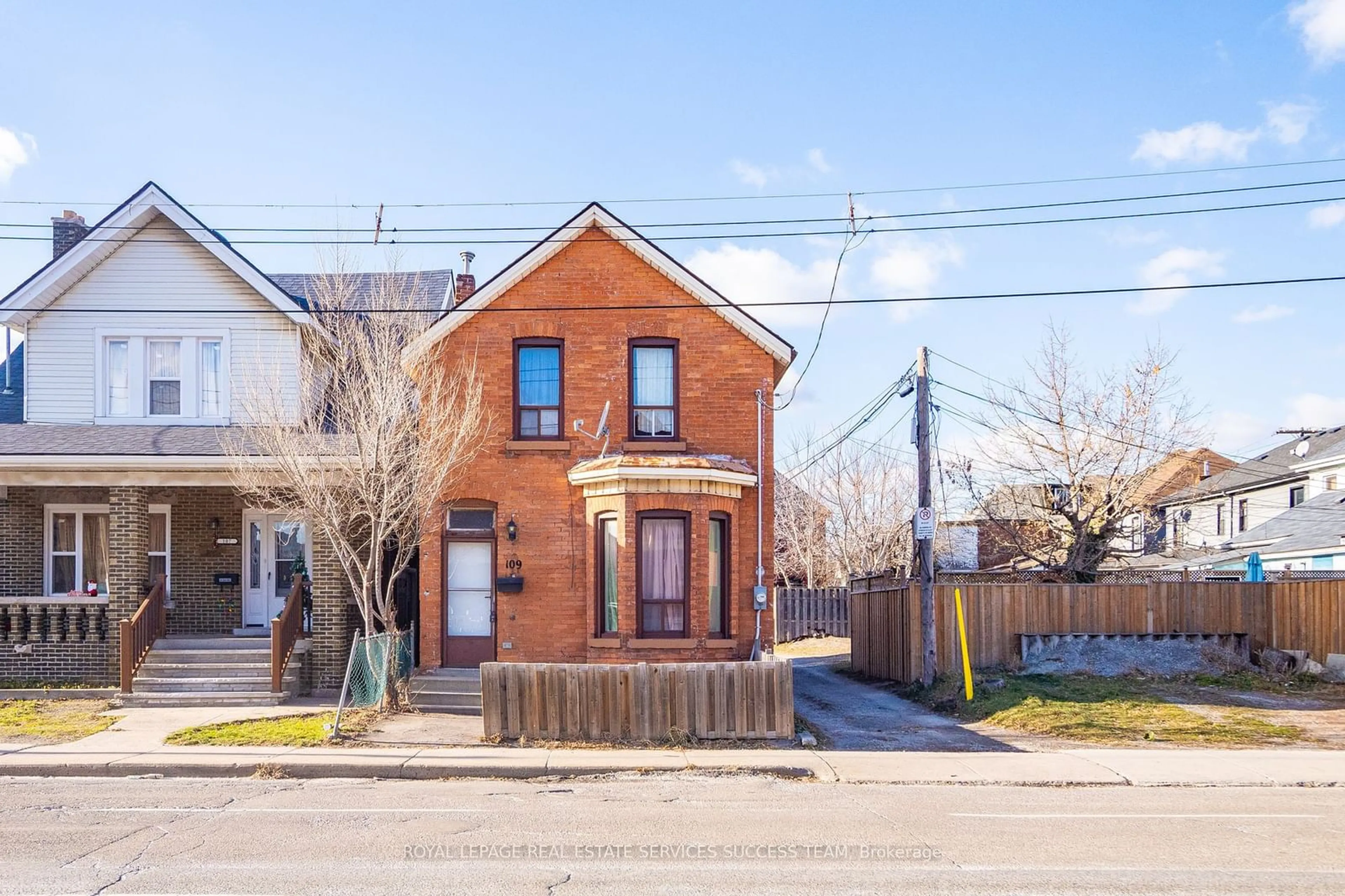 Home with brick exterior material, street for 109 Sanford Ave, Hamilton Ontario L8L 5Z1