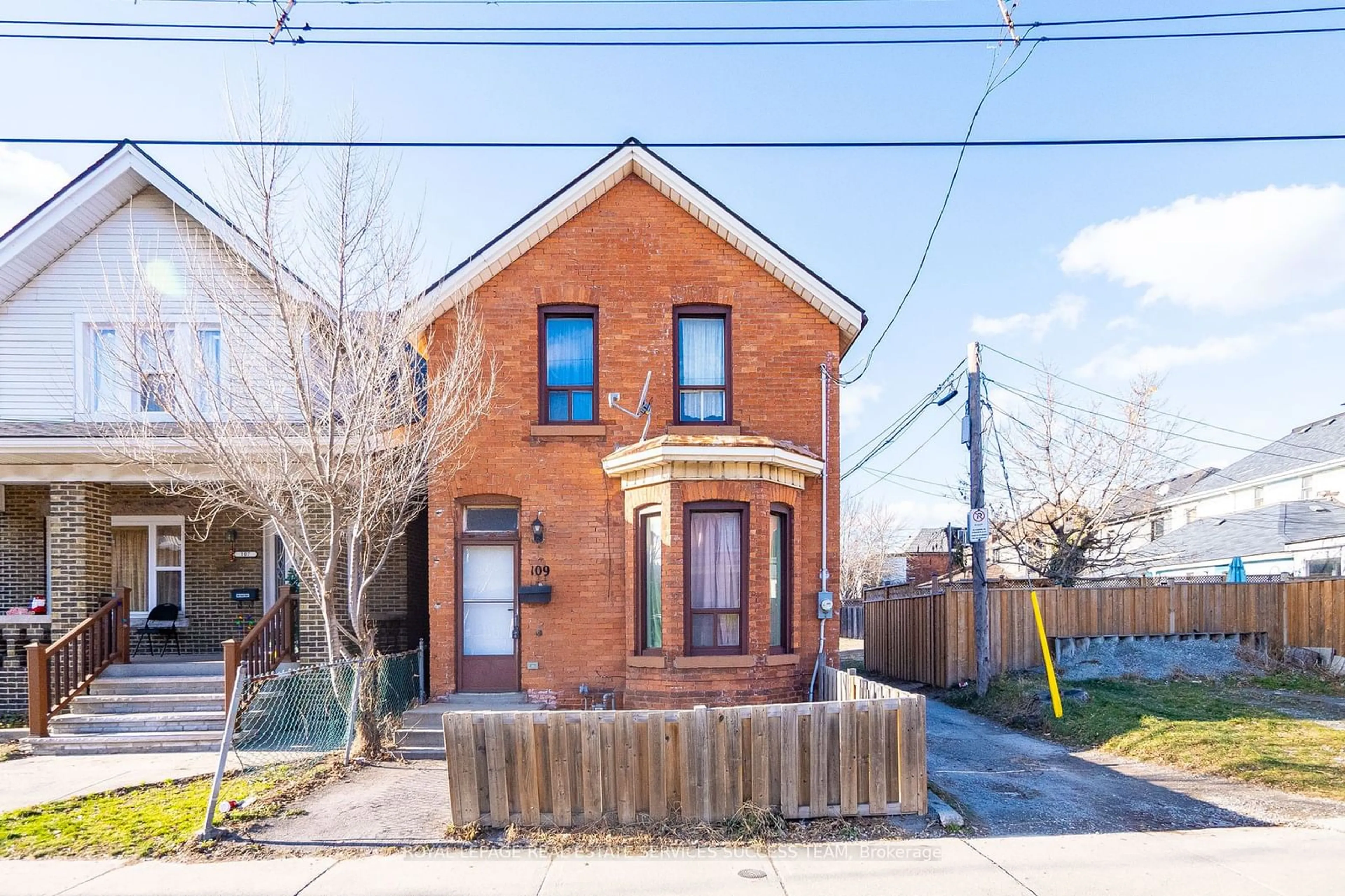 Home with brick exterior material, street for 109 Sanford Ave, Hamilton Ontario L8L 5Z1