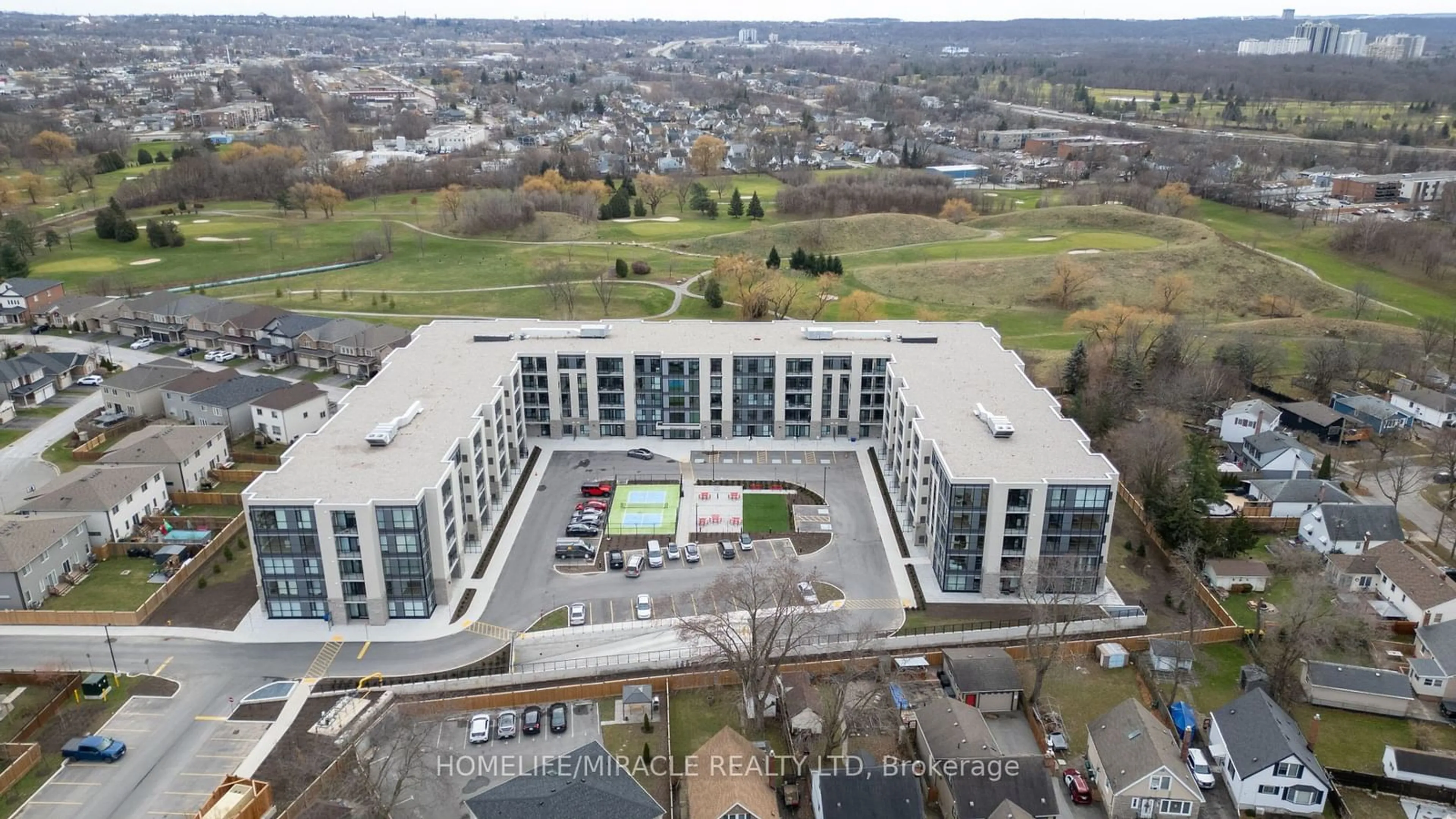 A pic from outside/outdoor area/front of a property/back of a property/a pic from drone, city buildings view from balcony for 50 Herrick Ave #LP40, St. Catharines Ontario L2P 2T9