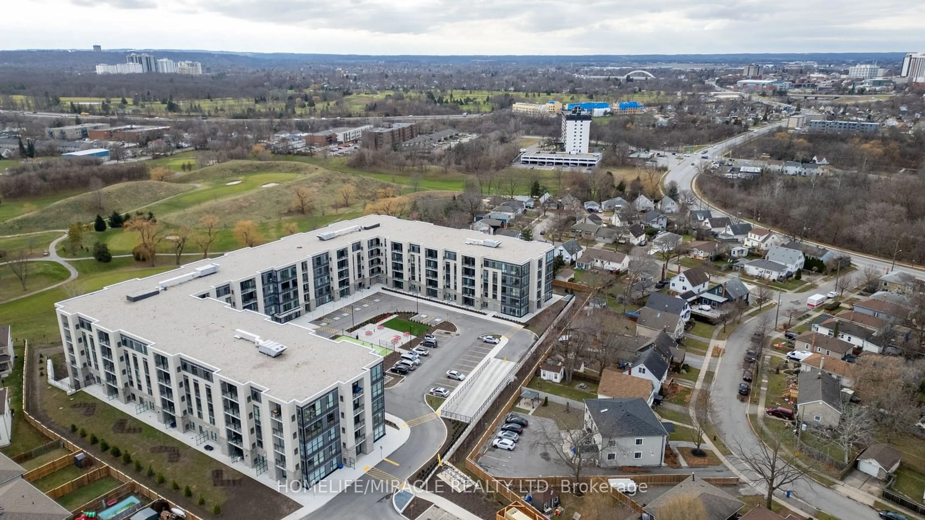 A pic from outside/outdoor area/front of a property/back of a property/a pic from drone, unknown for 50 Herrick Ave #LP40, St. Catharines Ontario L2P 2T9