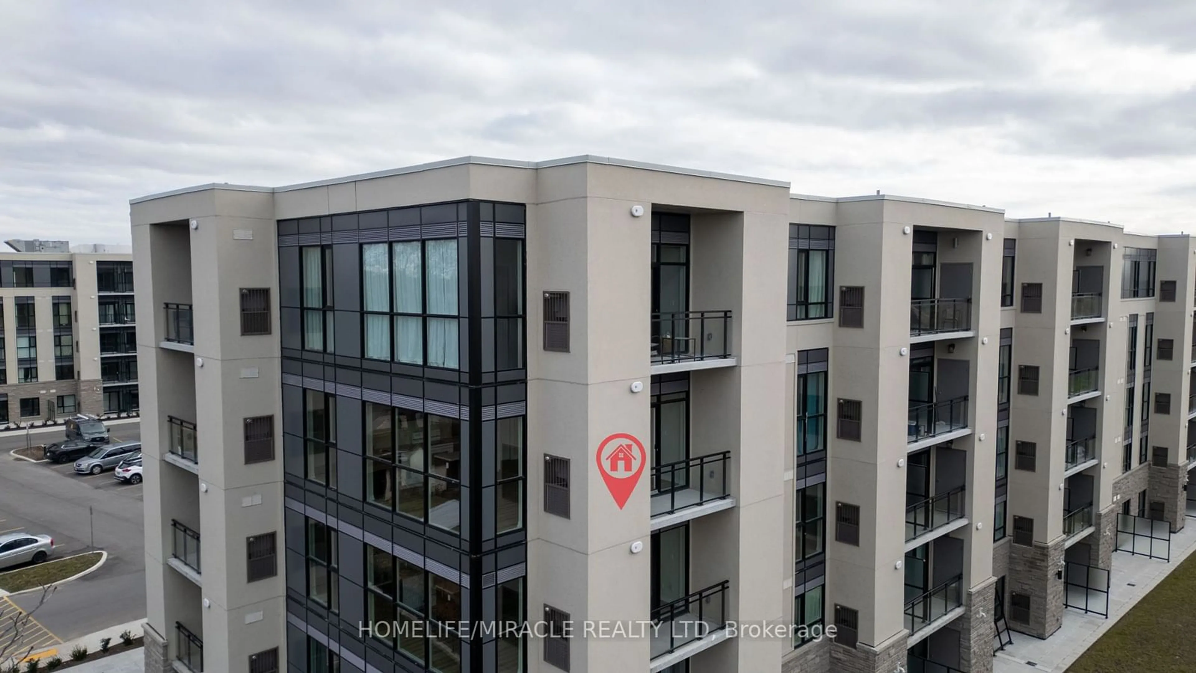 A pic from outside/outdoor area/front of a property/back of a property/a pic from drone, city buildings view from balcony for 50 Herrick Ave #LP40, St. Catharines Ontario L2P 2T9