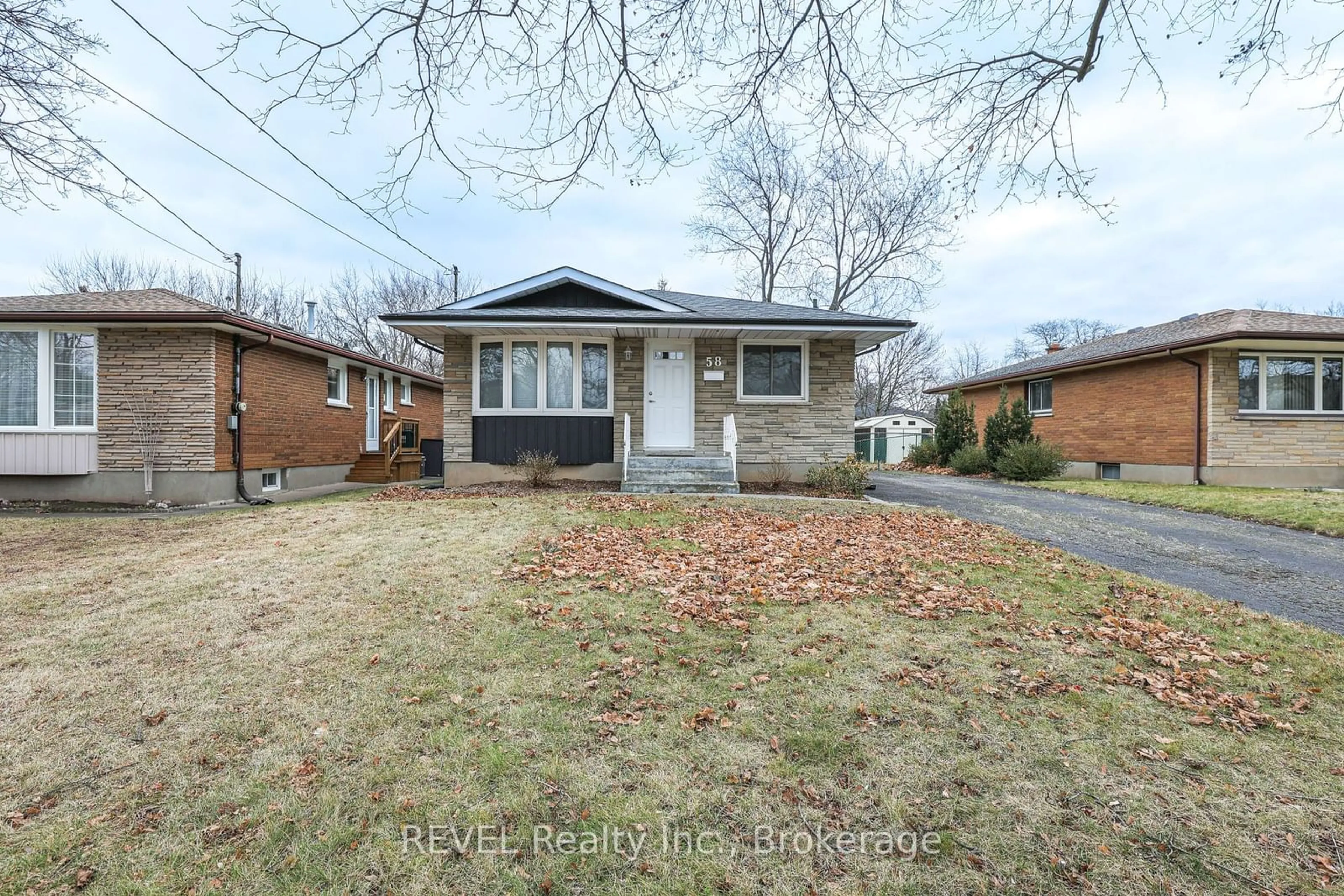 Home with brick exterior material, street for 58 Highcourt Cres, St. Catharines Ontario L2M 3M6