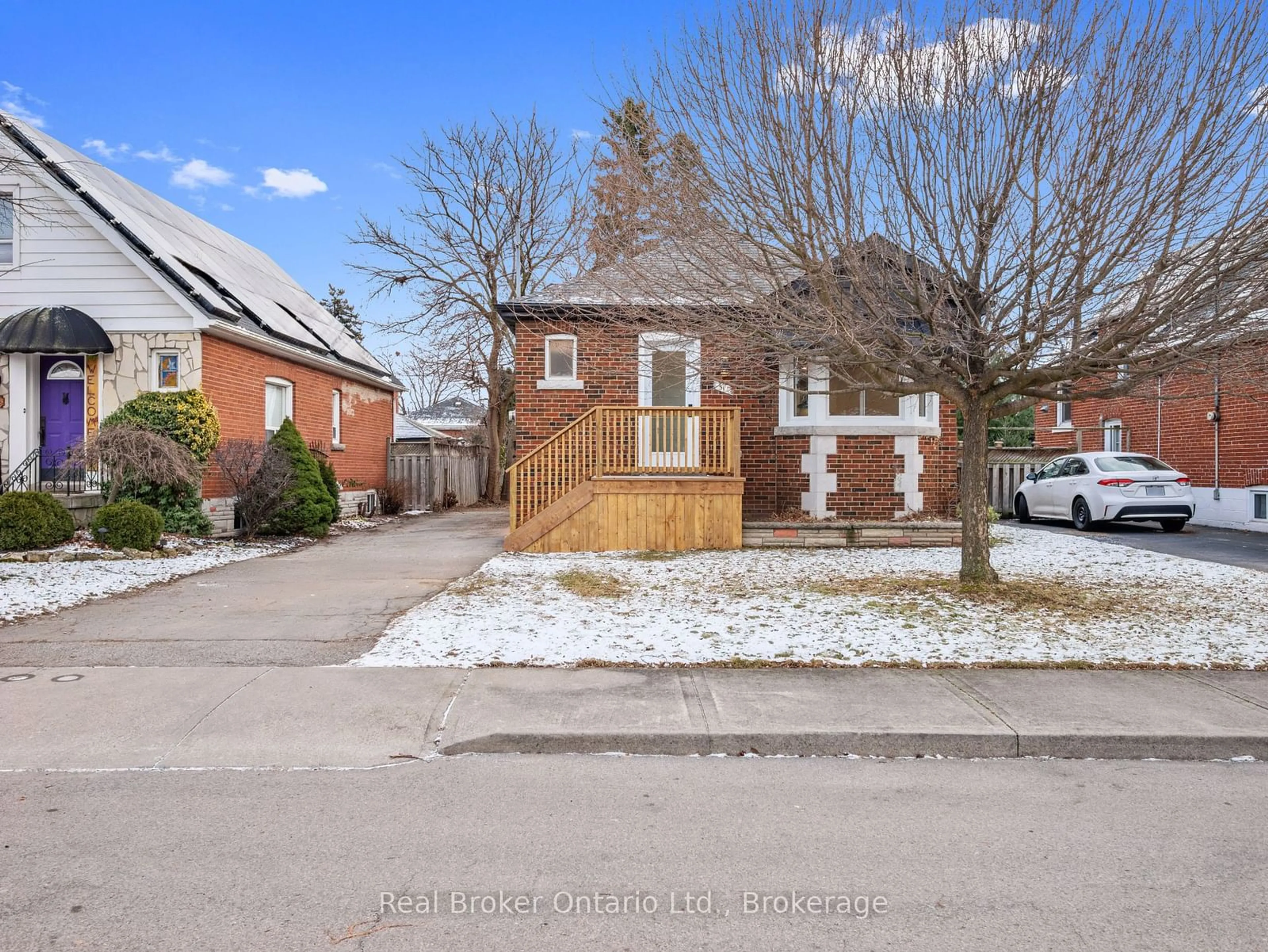 Home with brick exterior material, street for 51 Woodbridge Rd, Hamilton Ontario L8K 3C8