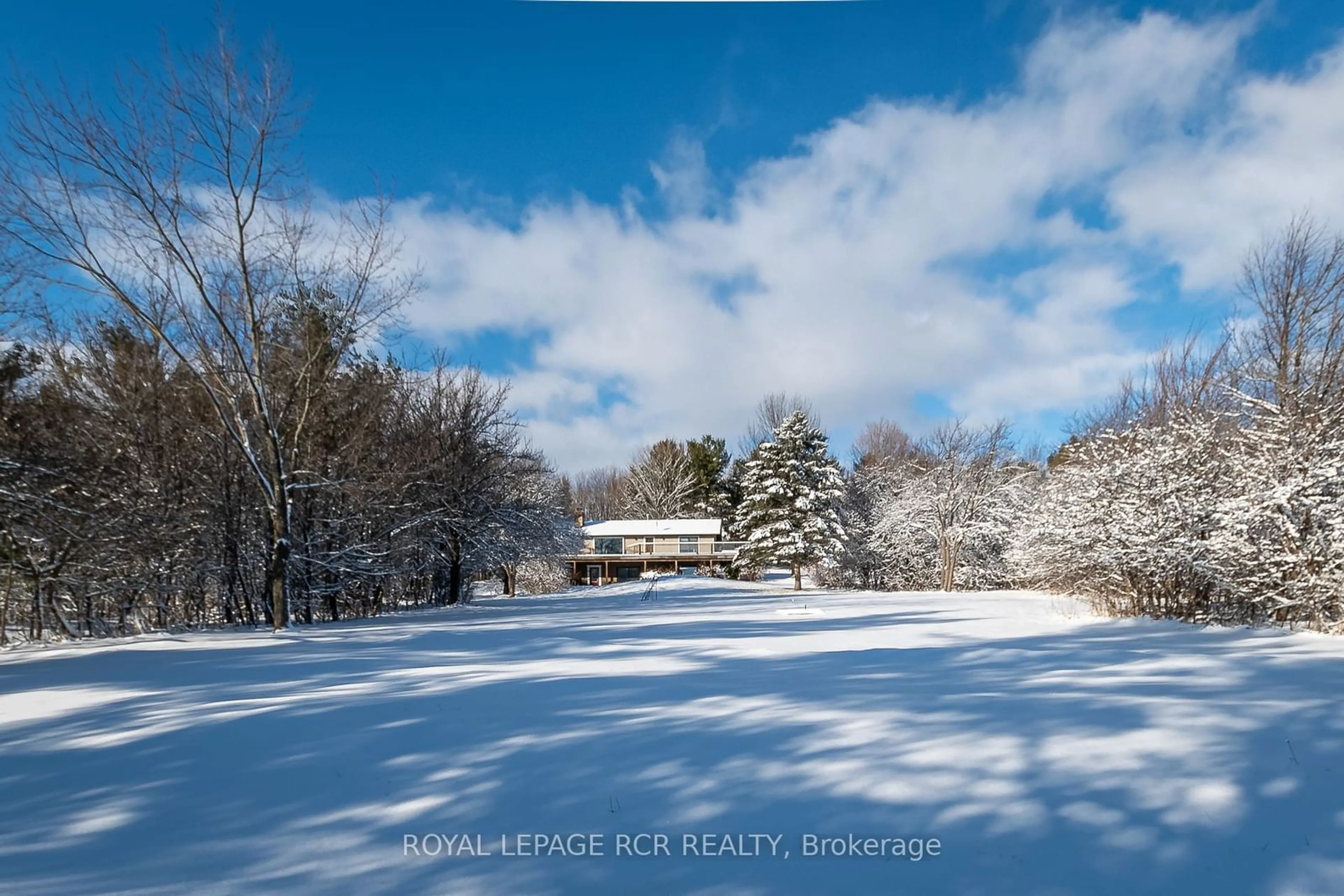 A pic from outside/outdoor area/front of a property/back of a property/a pic from drone, mountain view for 838742 4th Line, Mulmur Ontario L9V 0J7