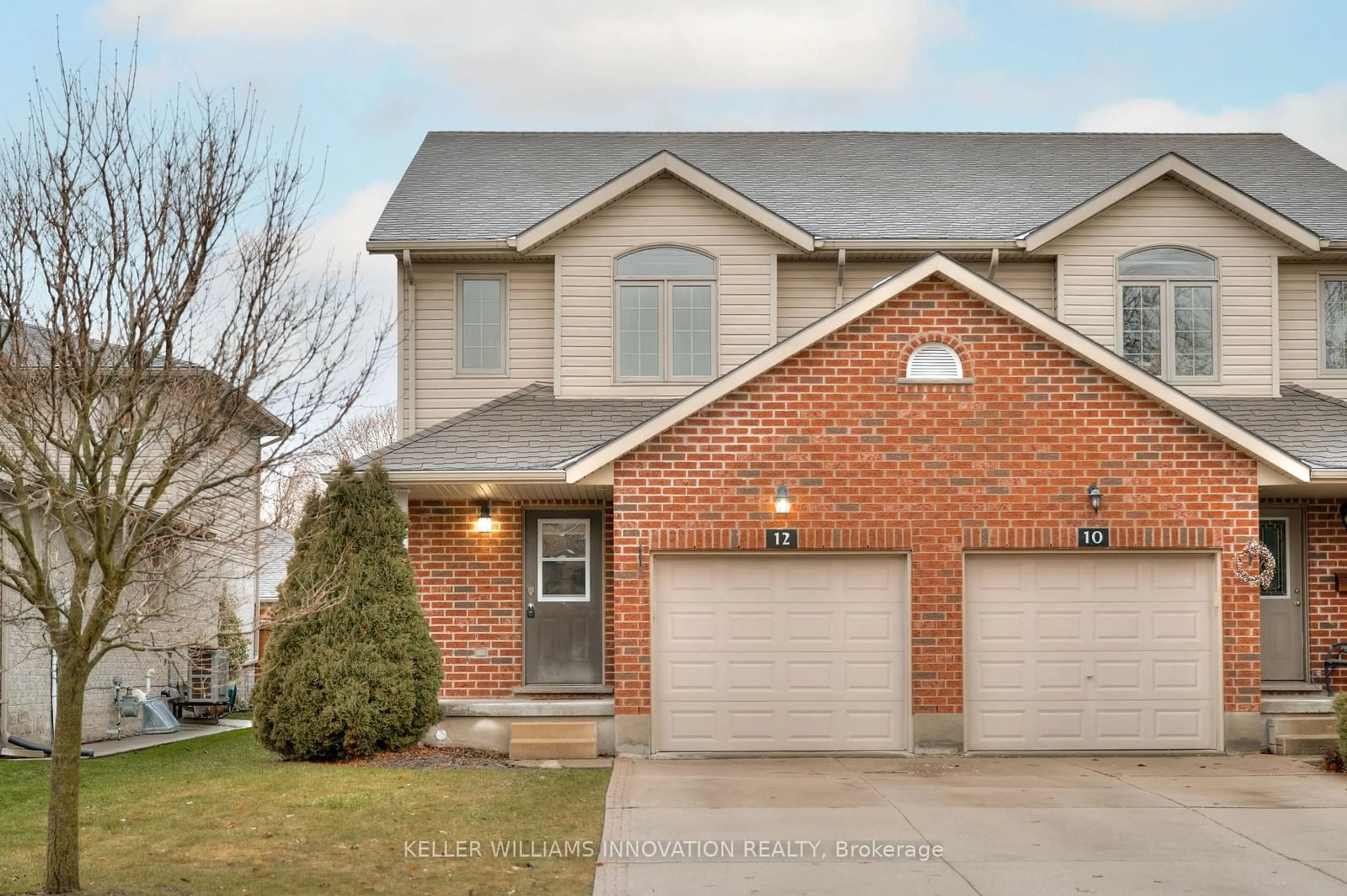 Home with brick exterior material, street for 12 College St, Stratford Ontario N5A 4R4