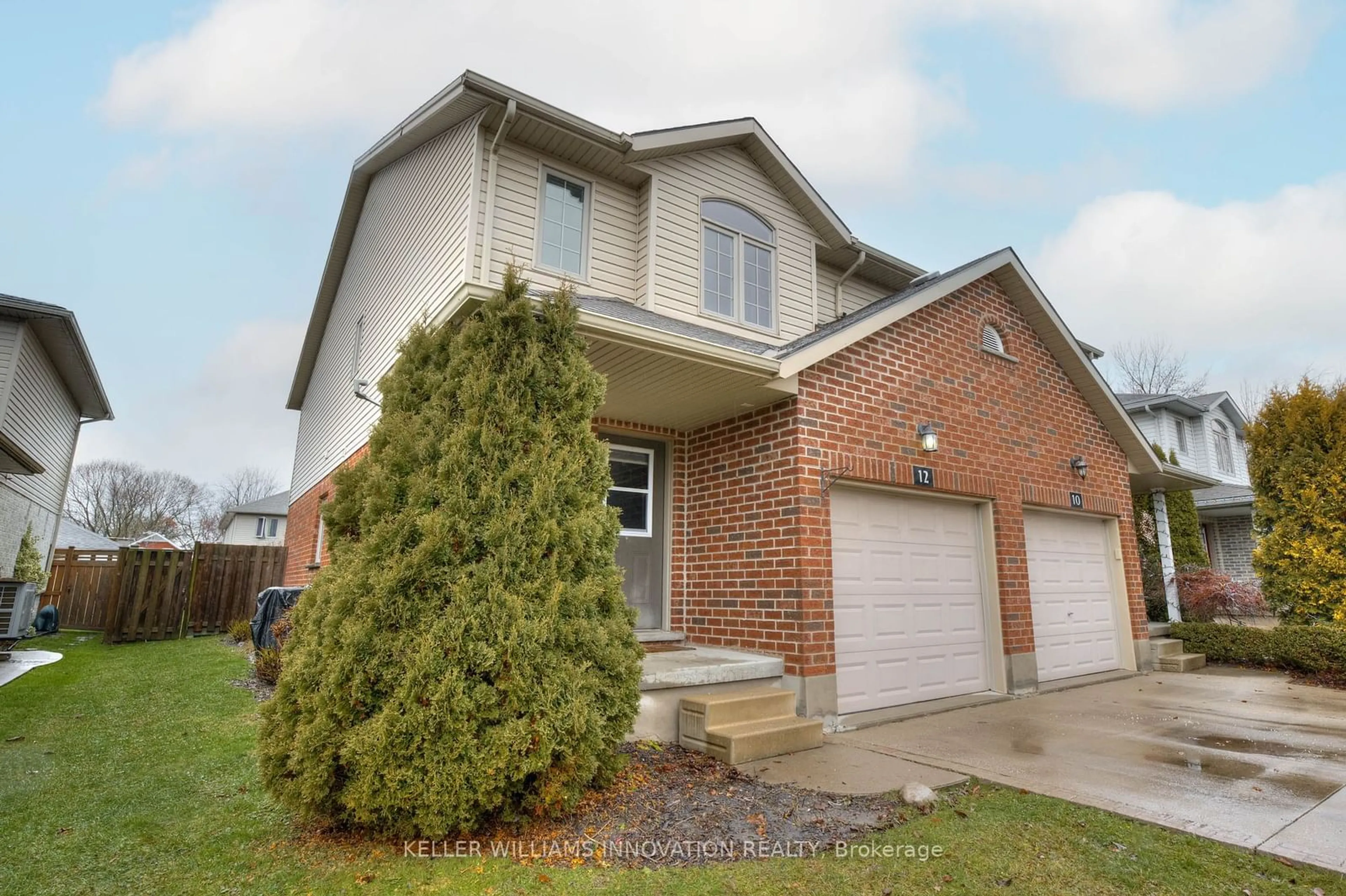 Home with brick exterior material, street for 12 College St, Stratford Ontario N5A 4R4