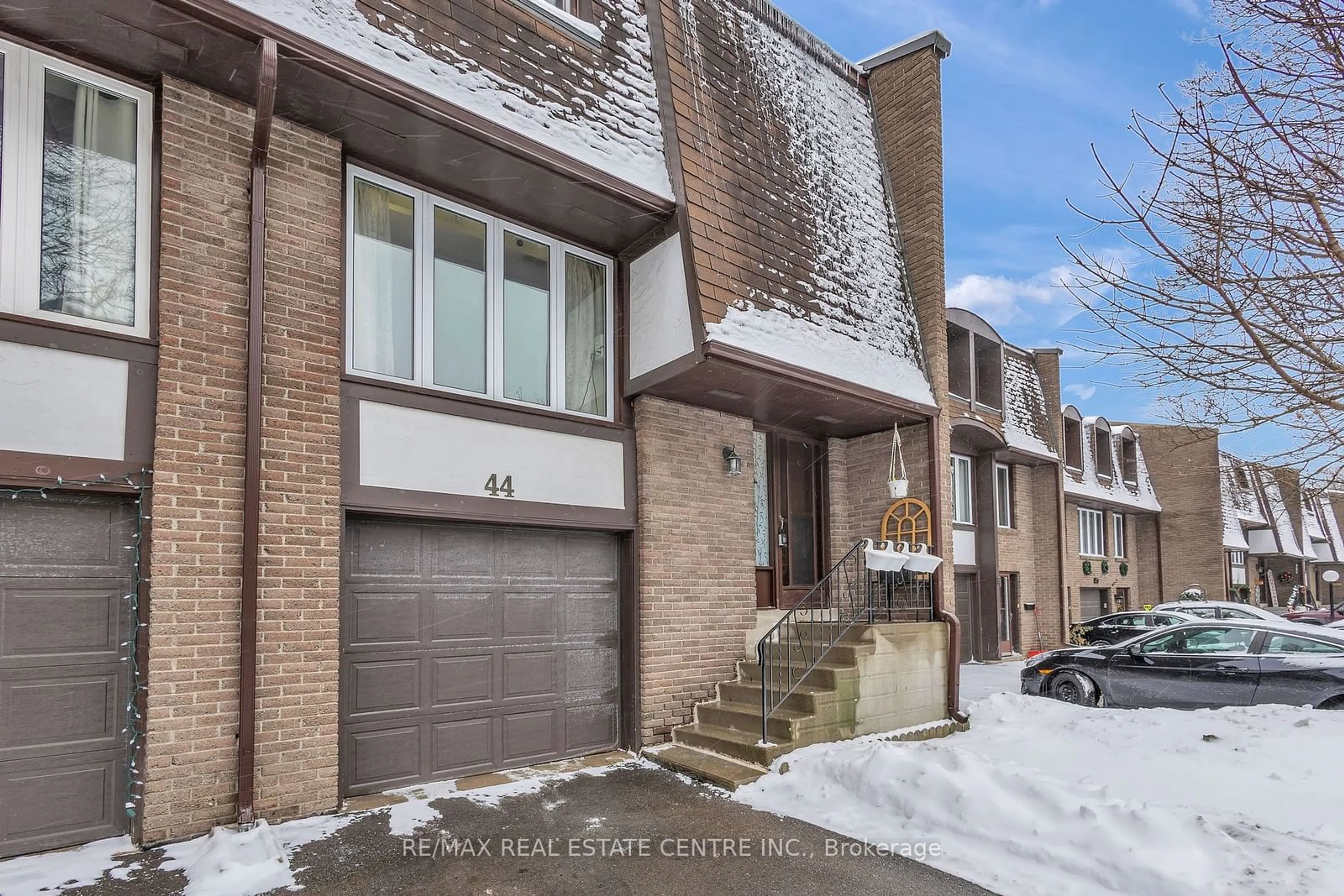 Home with brick exterior material, street for 46 Cedarwoods Cres #44, Kitchener Ontario N2C 2L7