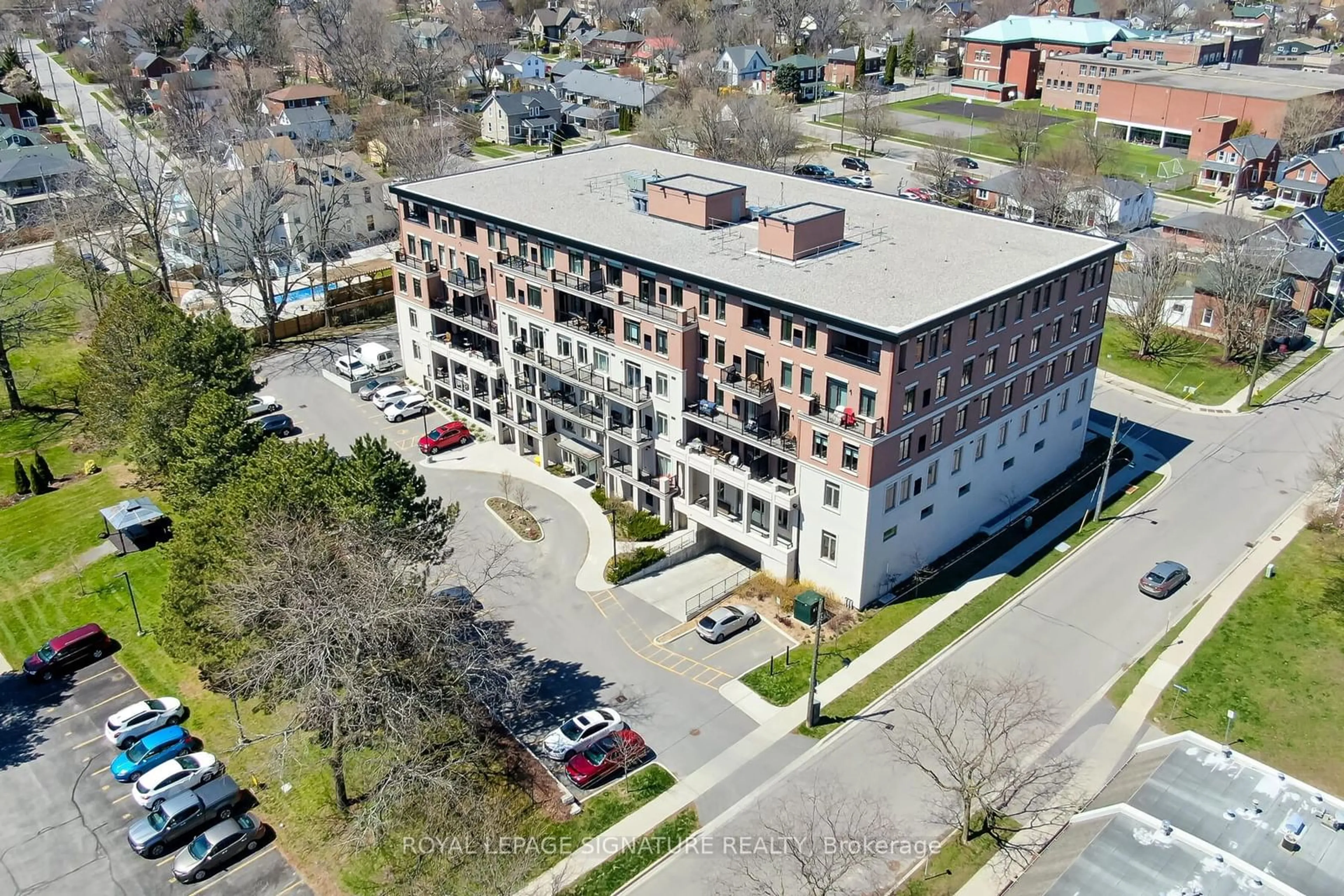 A pic from outside/outdoor area/front of a property/back of a property/a pic from drone, building for 135 Orr St #311, Cobourg Ontario K9A 0J6