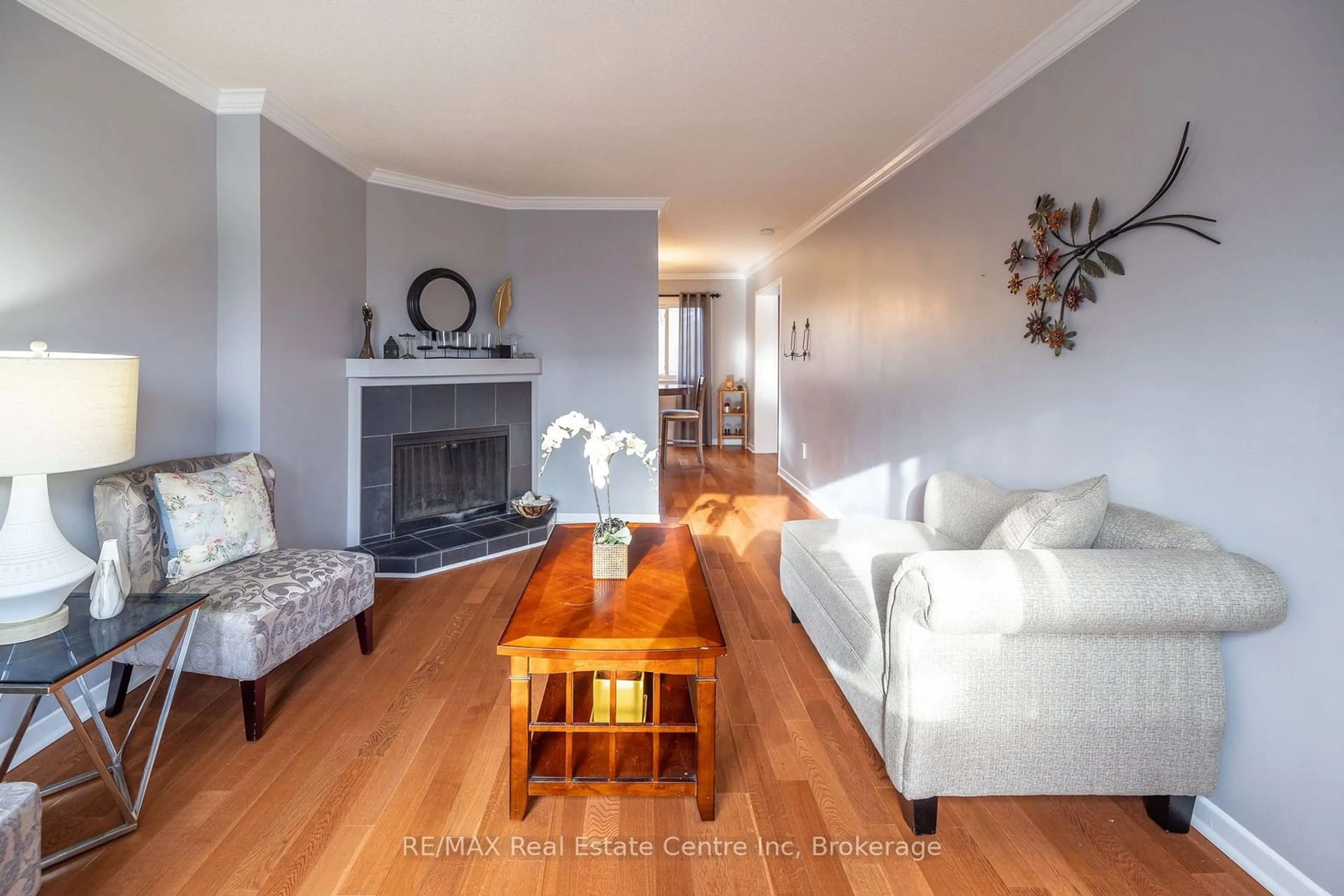 Living room with furniture, wood/laminate floor for 295 Water St #15, Guelph Ontario N1G 2X5