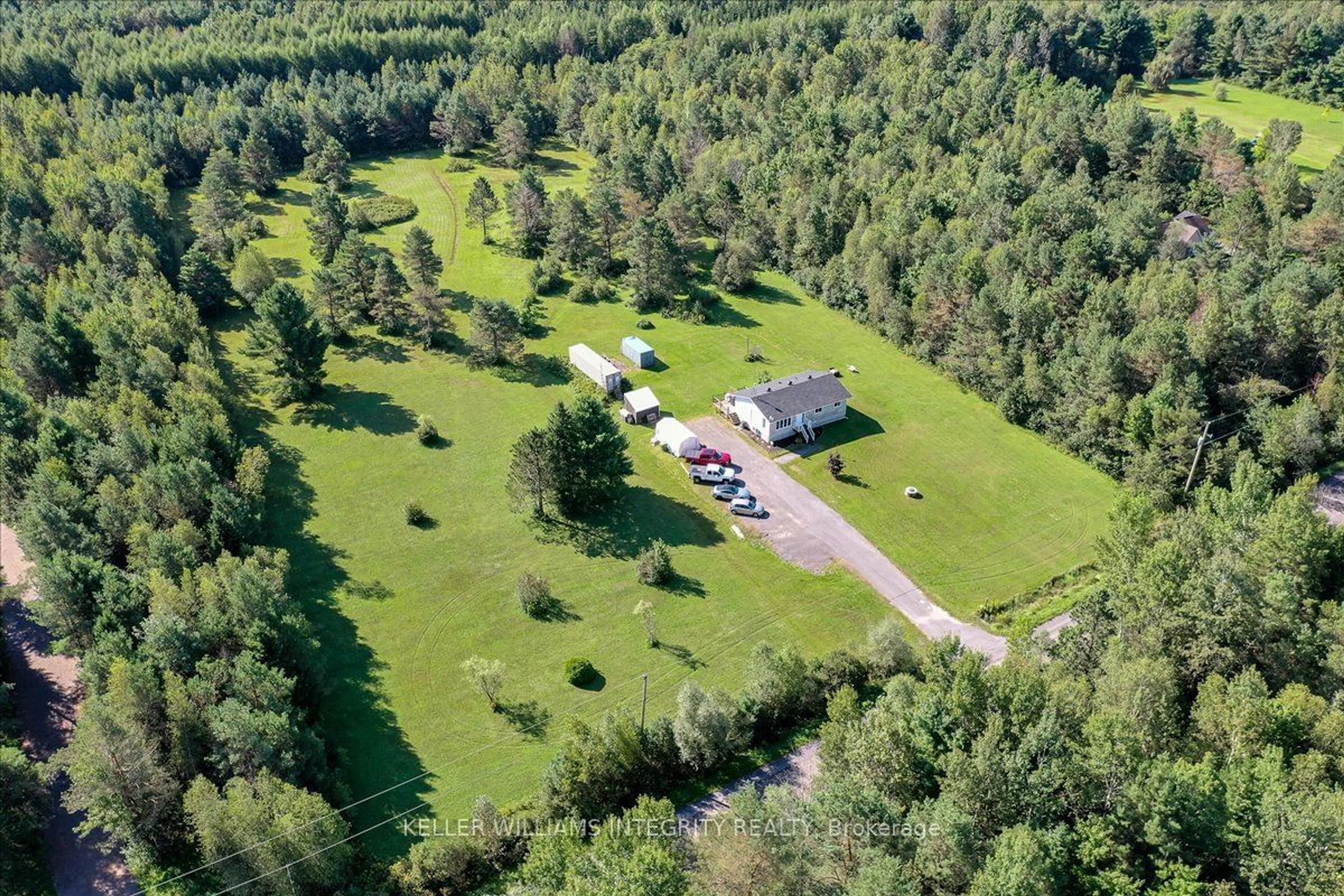 A pic from outside/outdoor area/front of a property/back of a property/a pic from drone, forest/trees view for 3992 DEVINE Rd, Orleans - Cumberland and Area Ontario K4B 1S5