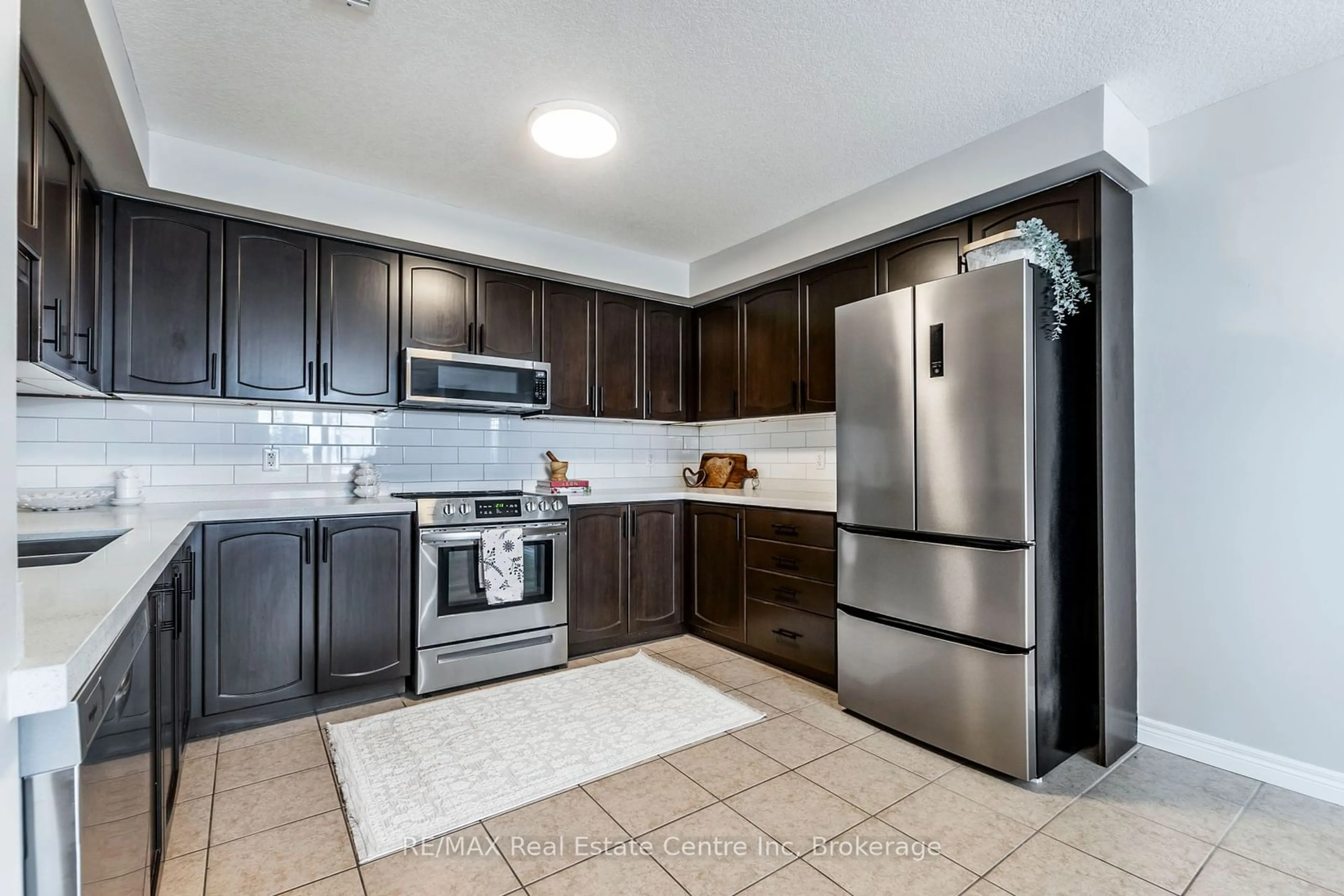 Standard kitchen, ceramic/tile floor for 904 Paisley Rd #202, Guelph Ontario N1K 0C6