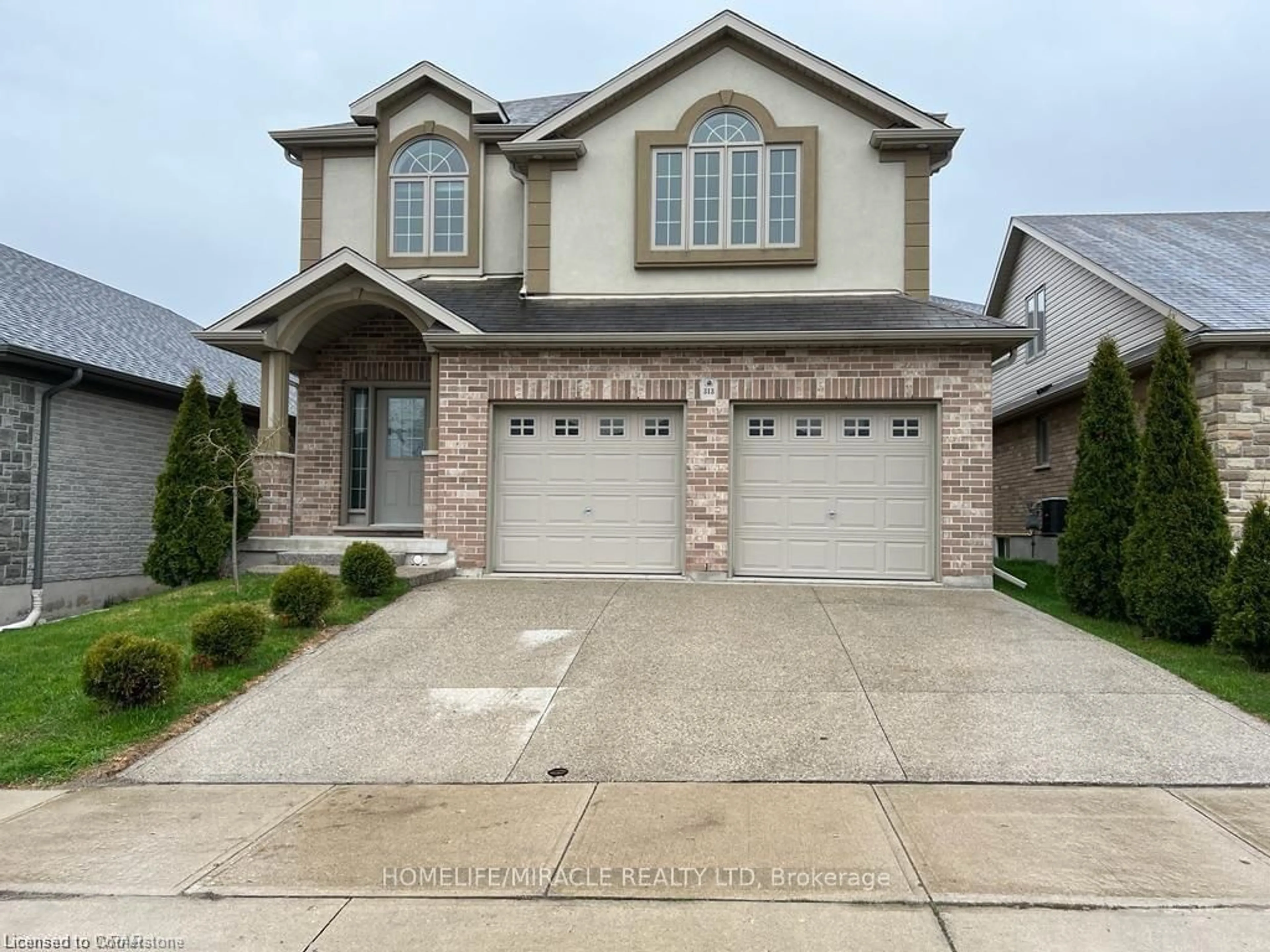 Home with brick exterior material, street for 313 Zeller Dr, Kitchener Ontario N2A 0B2