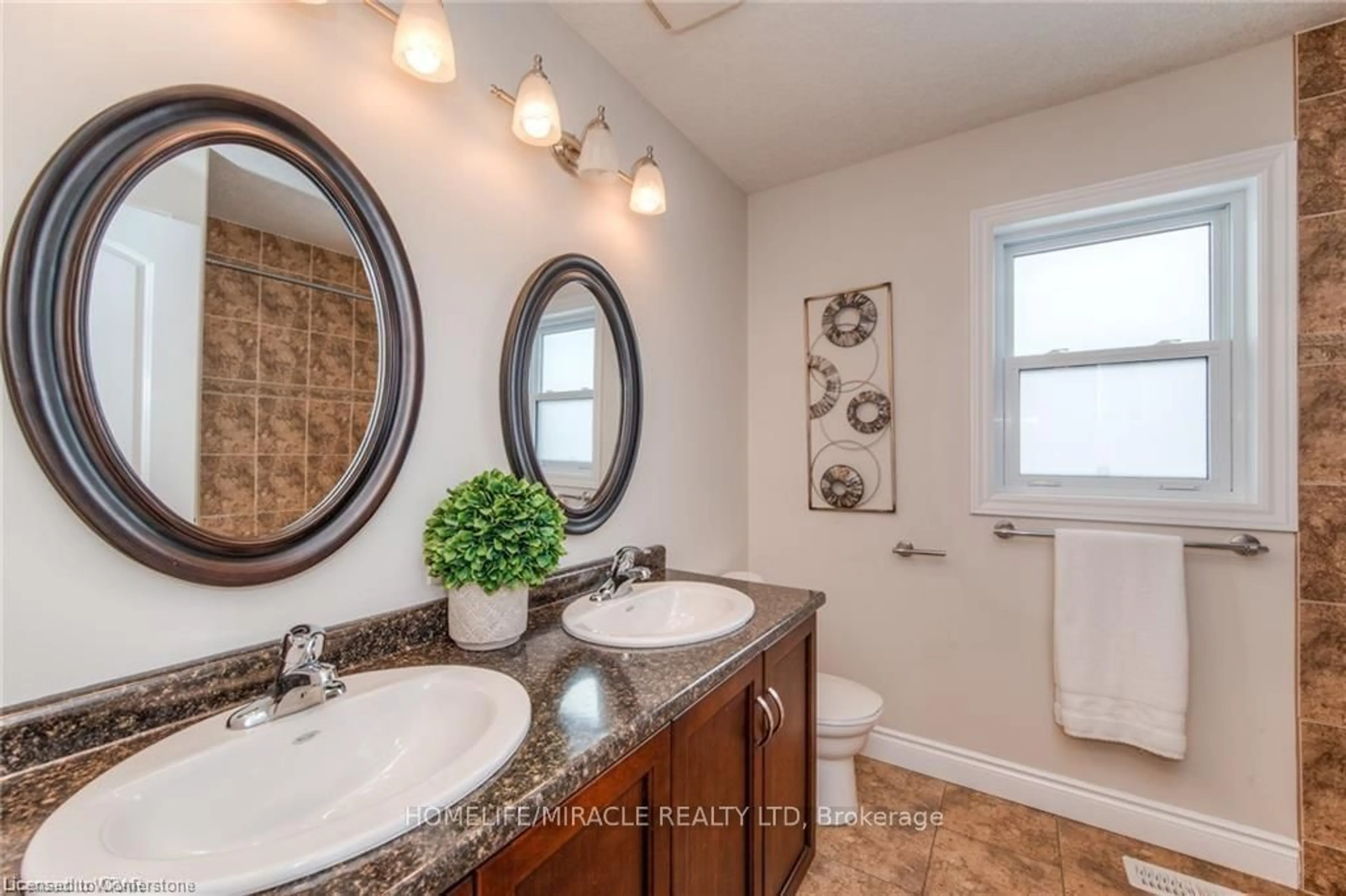 Standard bathroom, ceramic/tile floor for 313 Zeller Dr, Kitchener Ontario N2A 0B2