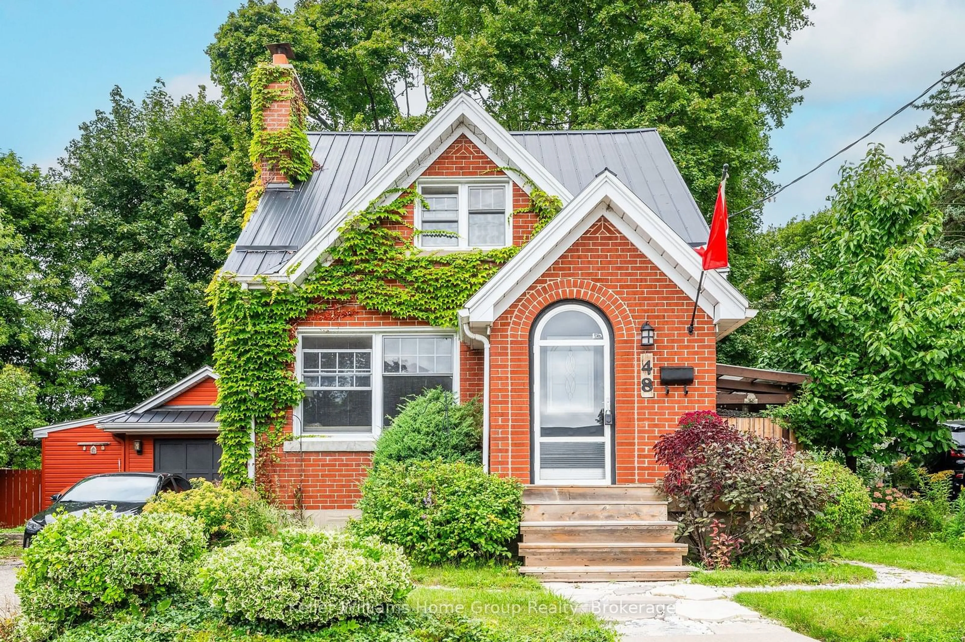 Home with brick exterior material, street for 48 Dane St, Kitchener Ontario N2H 3H7