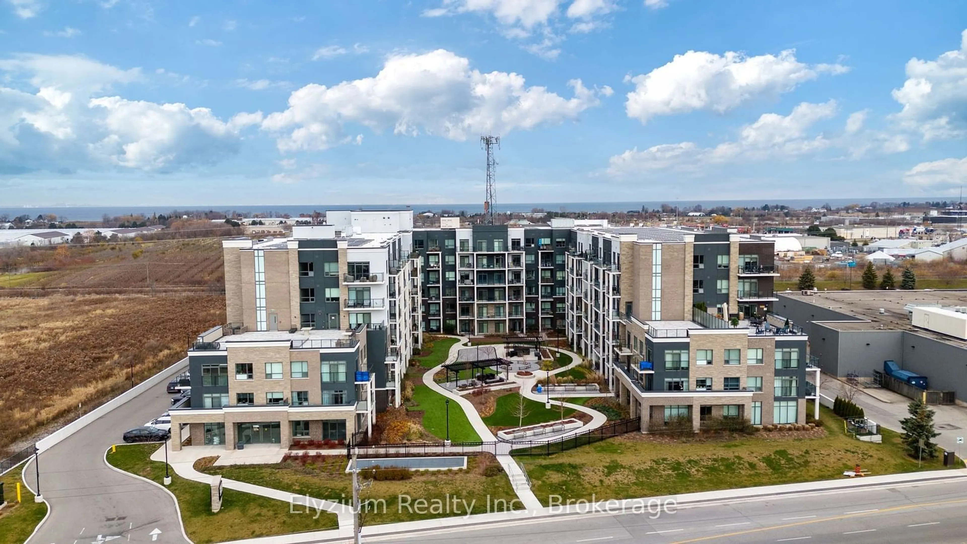 A pic from outside/outdoor area/front of a property/back of a property/a pic from drone, city buildings view from balcony for 5055 Greenlane Rd #127, Lincoln Ontario L3J 2J3