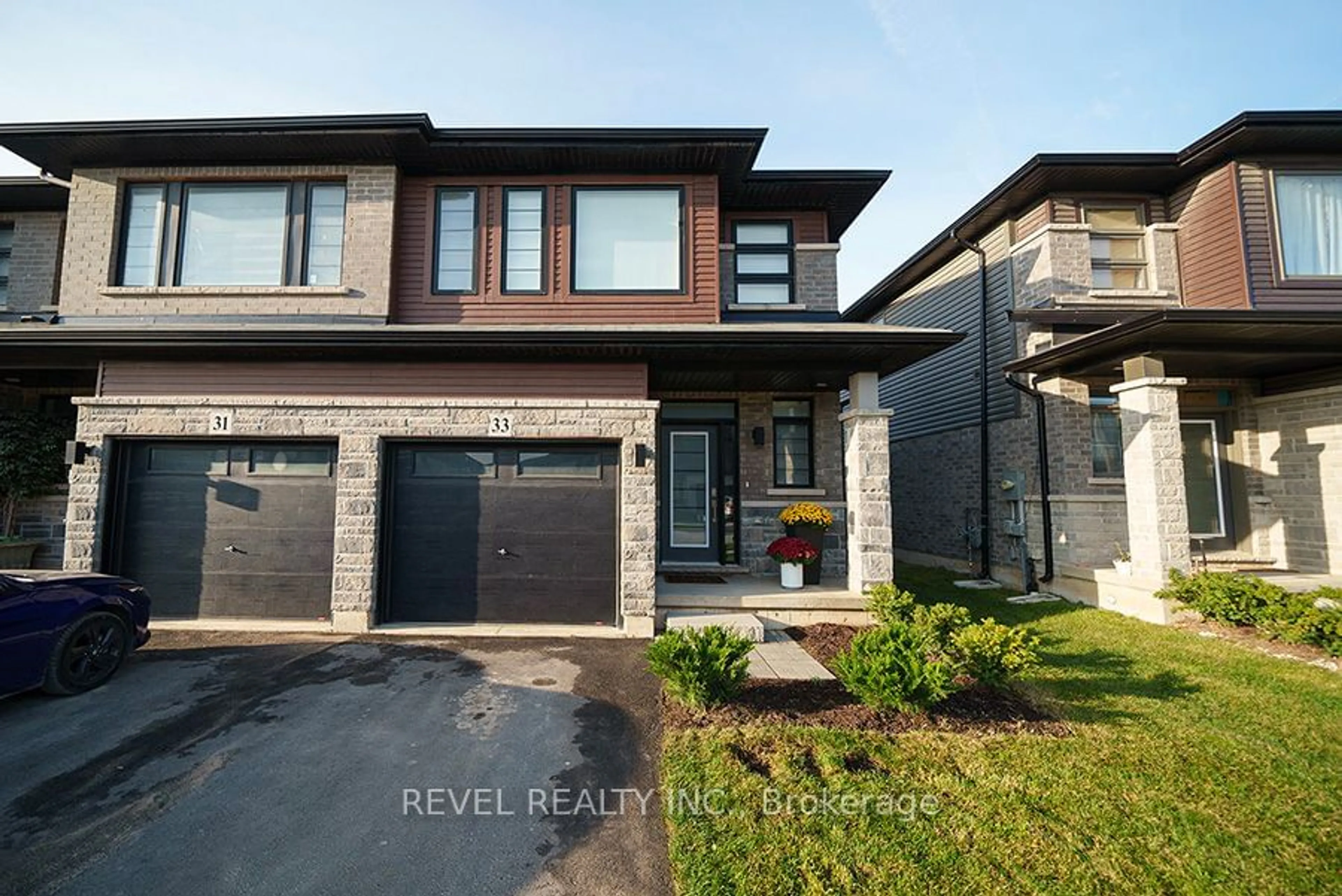 Home with brick exterior material, street for 33 June Callwood Way, Brantford Ontario N3T 0V1