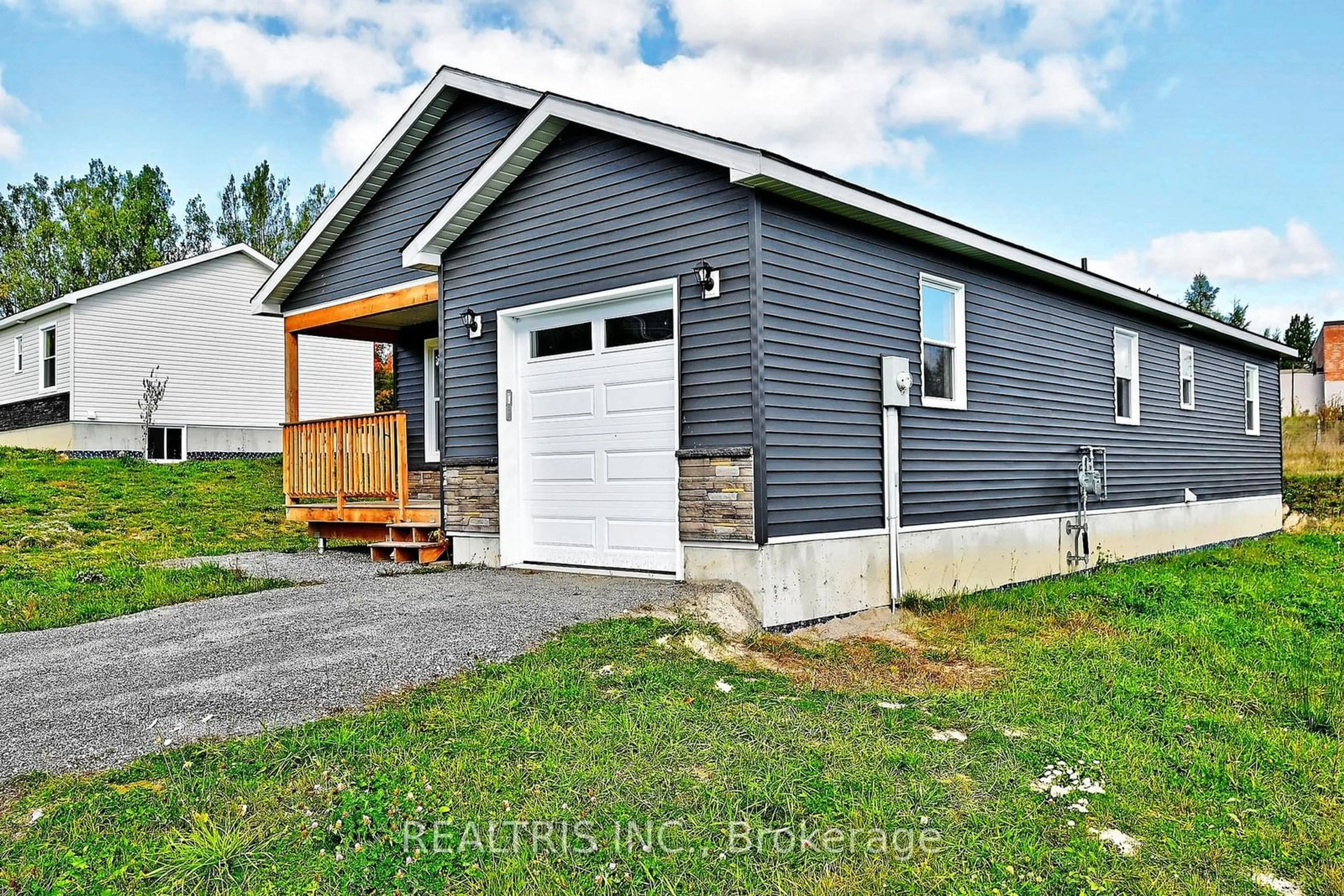 Home with vinyl exterior material, street for 146 Patricia St, Sudbury Remote Area Ontario P3Y 1A1