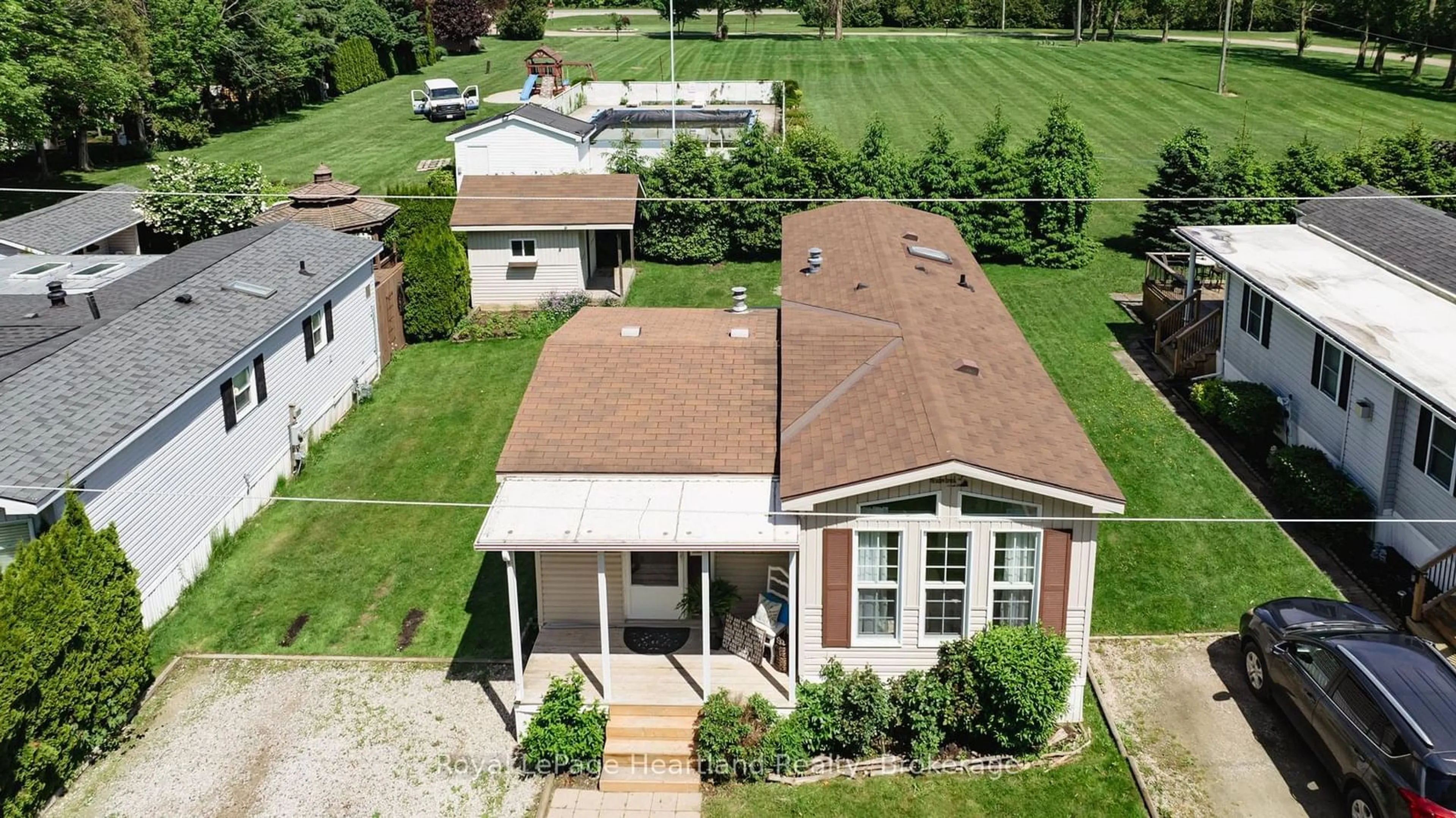 A pic from outside/outdoor area/front of a property/back of a property/a pic from drone, unknown for 77307 BLUEWATER HIGHWAY #49, Central Huron Ontario N0M 1G0