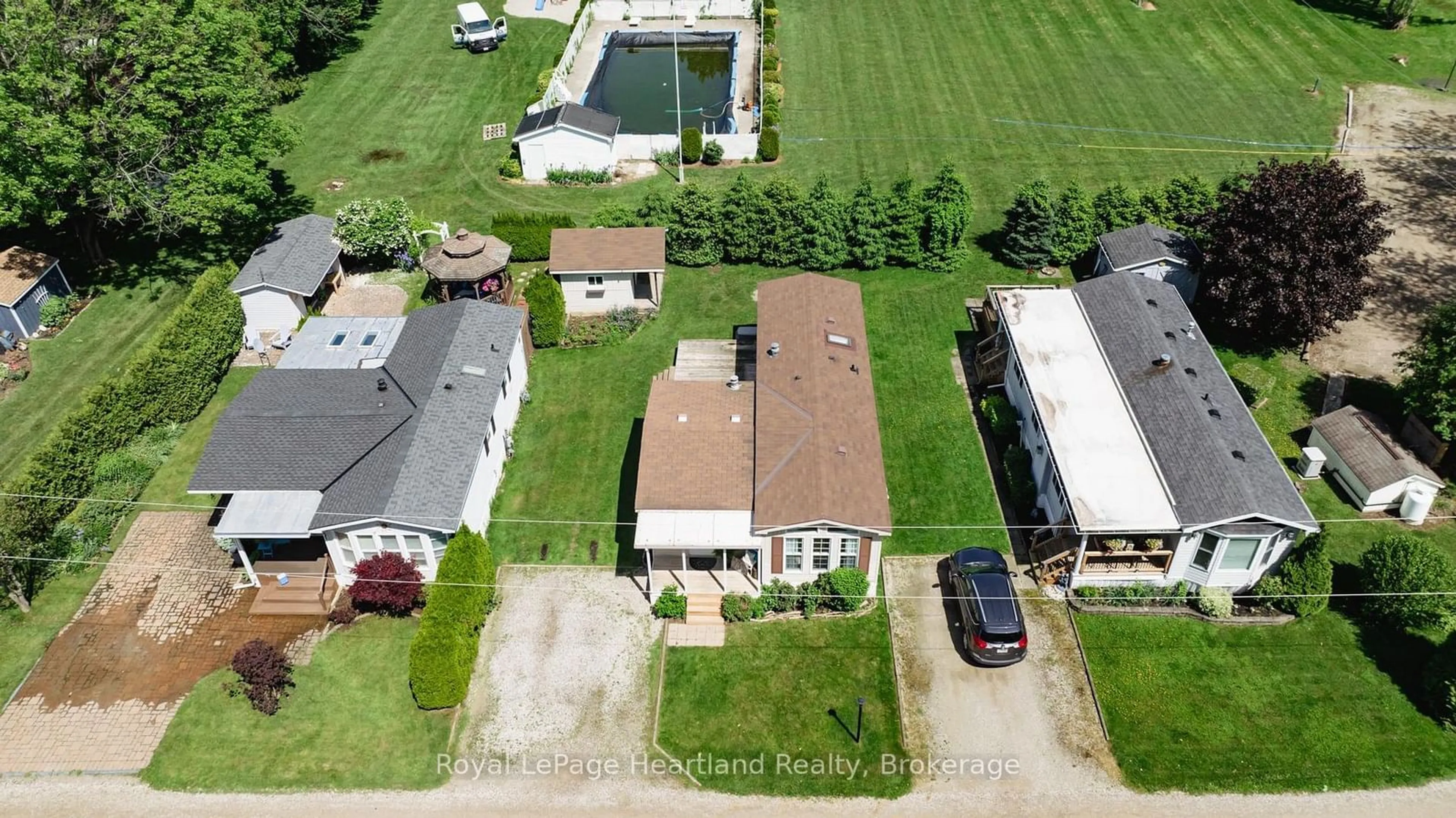 A pic from outside/outdoor area/front of a property/back of a property/a pic from drone, street for 77307 BLUEWATER HIGHWAY #49, Central Huron Ontario N0M 1G0