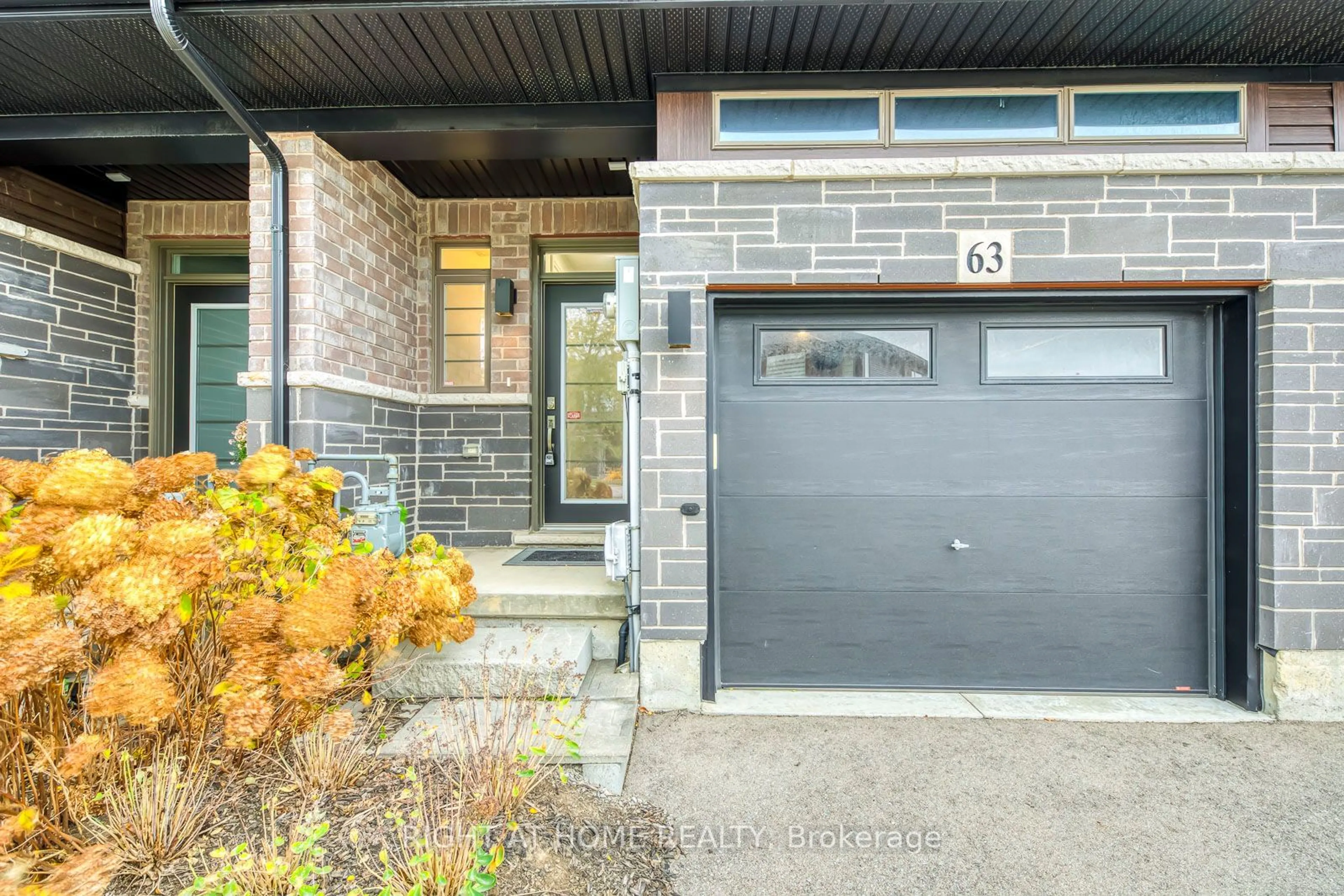 Home with brick exterior material, street for 63 Burley Lane, Hamilton Ontario L9G 0G5