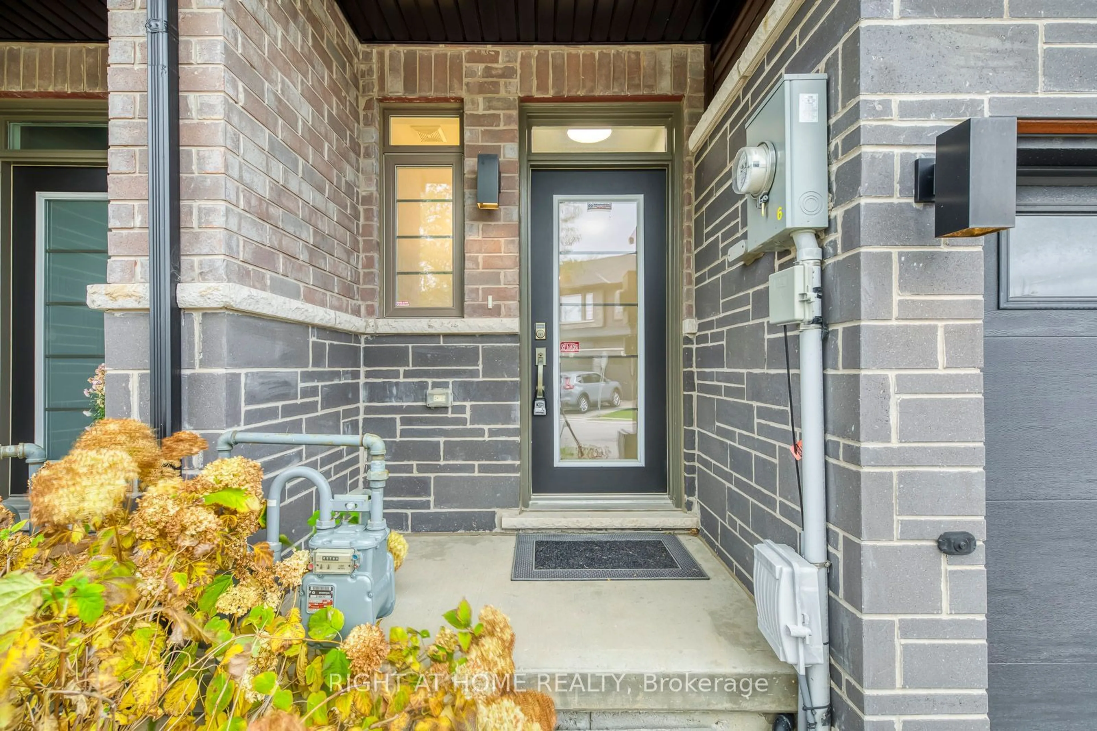 Home with brick exterior material, street for 63 Burley Lane, Hamilton Ontario L9G 0G5