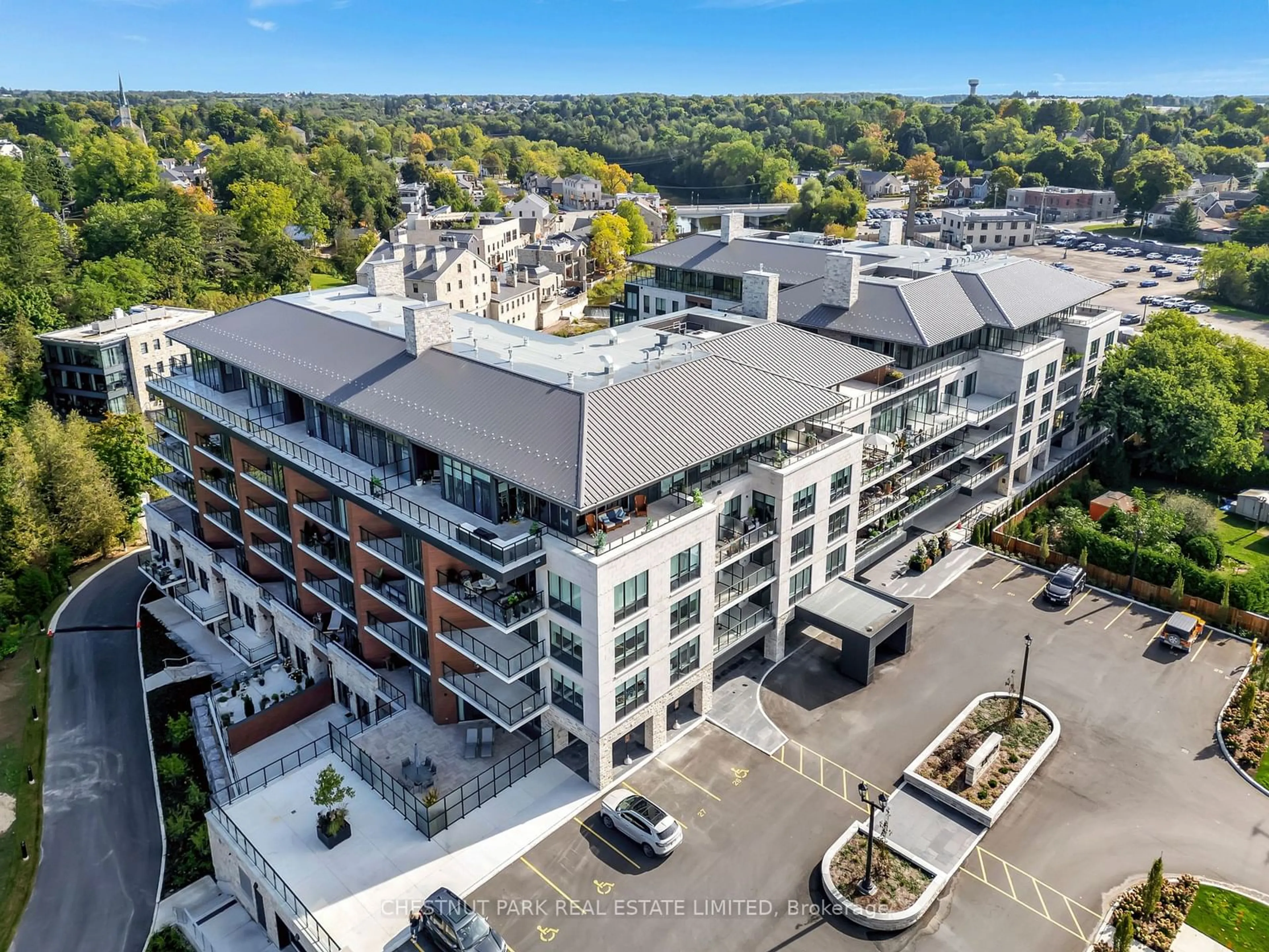 A pic from outside/outdoor area/front of a property/back of a property/a pic from drone, city buildings view from balcony for 6523 Wellington Rd #407, Centre Wellington Ontario N0B 1S0