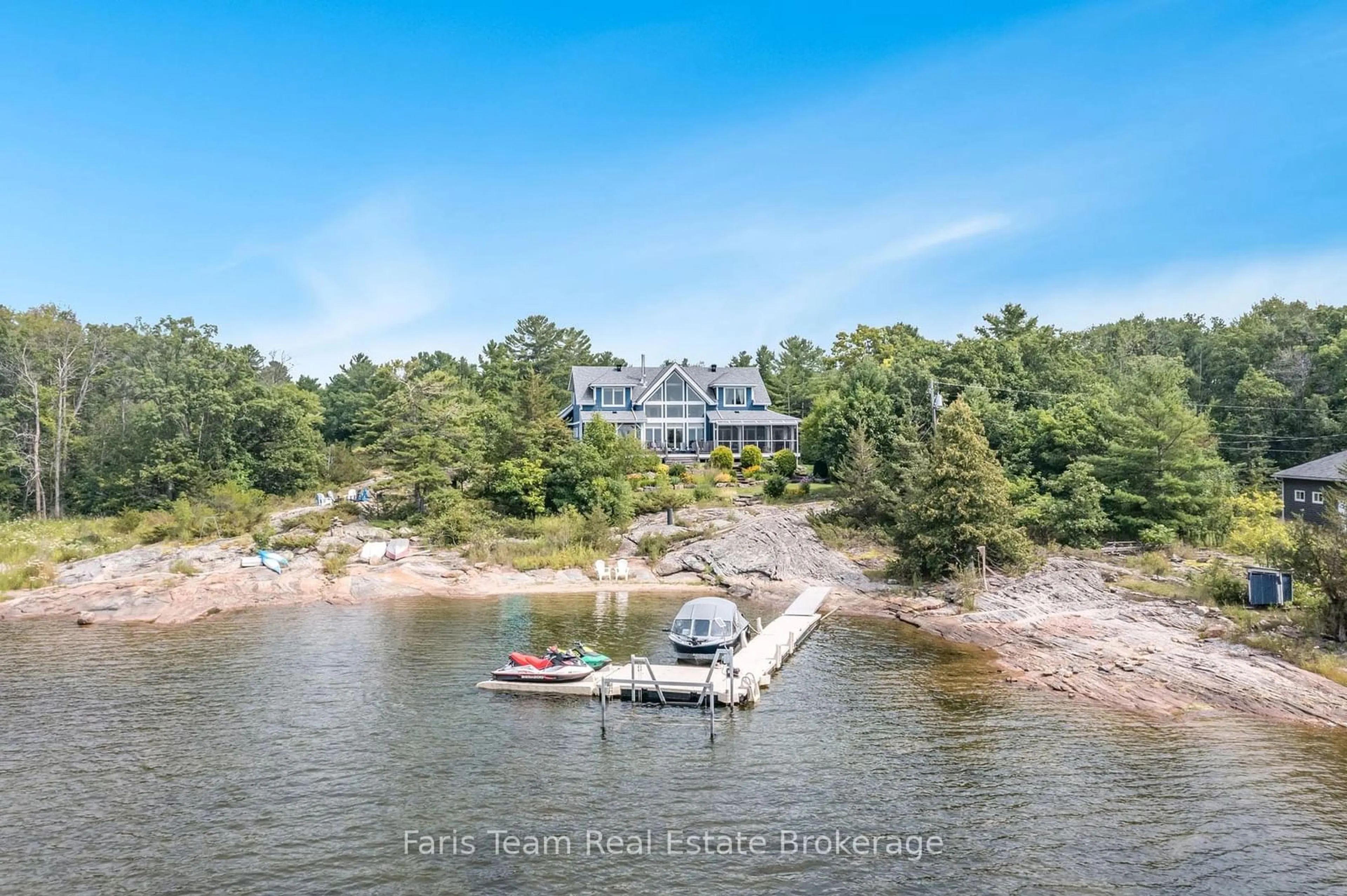 A pic from outside/outdoor area/front of a property/back of a property/a pic from drone, water/lake/river/ocean view for 70 Kamenni Bay Rd, Georgian Bay Ontario L0K 1S0