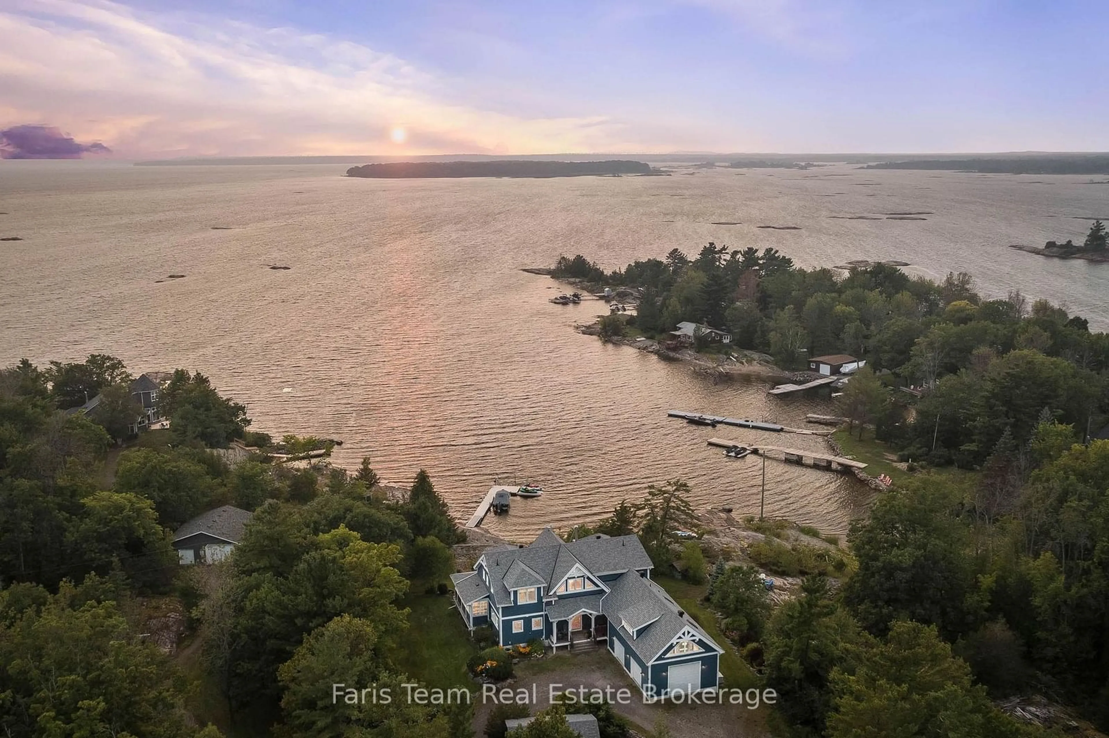 A pic from outside/outdoor area/front of a property/back of a property/a pic from drone, water/lake/river/ocean view for 70 Kamenni Bay Rd, Georgian Bay Ontario L0K 1S0