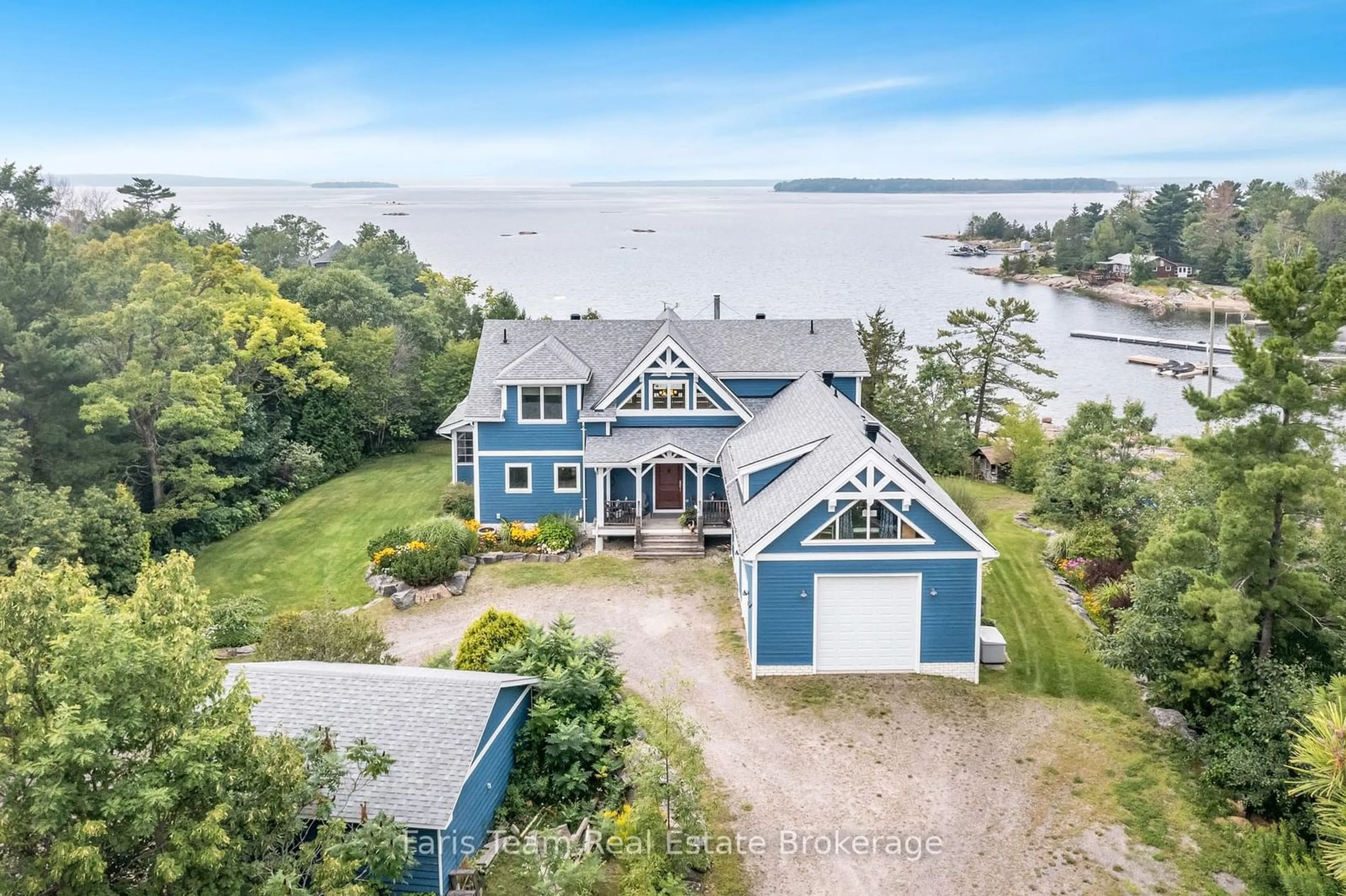 A pic from outside/outdoor area/front of a property/back of a property/a pic from drone, water/lake/river/ocean view for 70 Kamenni Bay Rd, Georgian Bay Ontario L0K 1S0