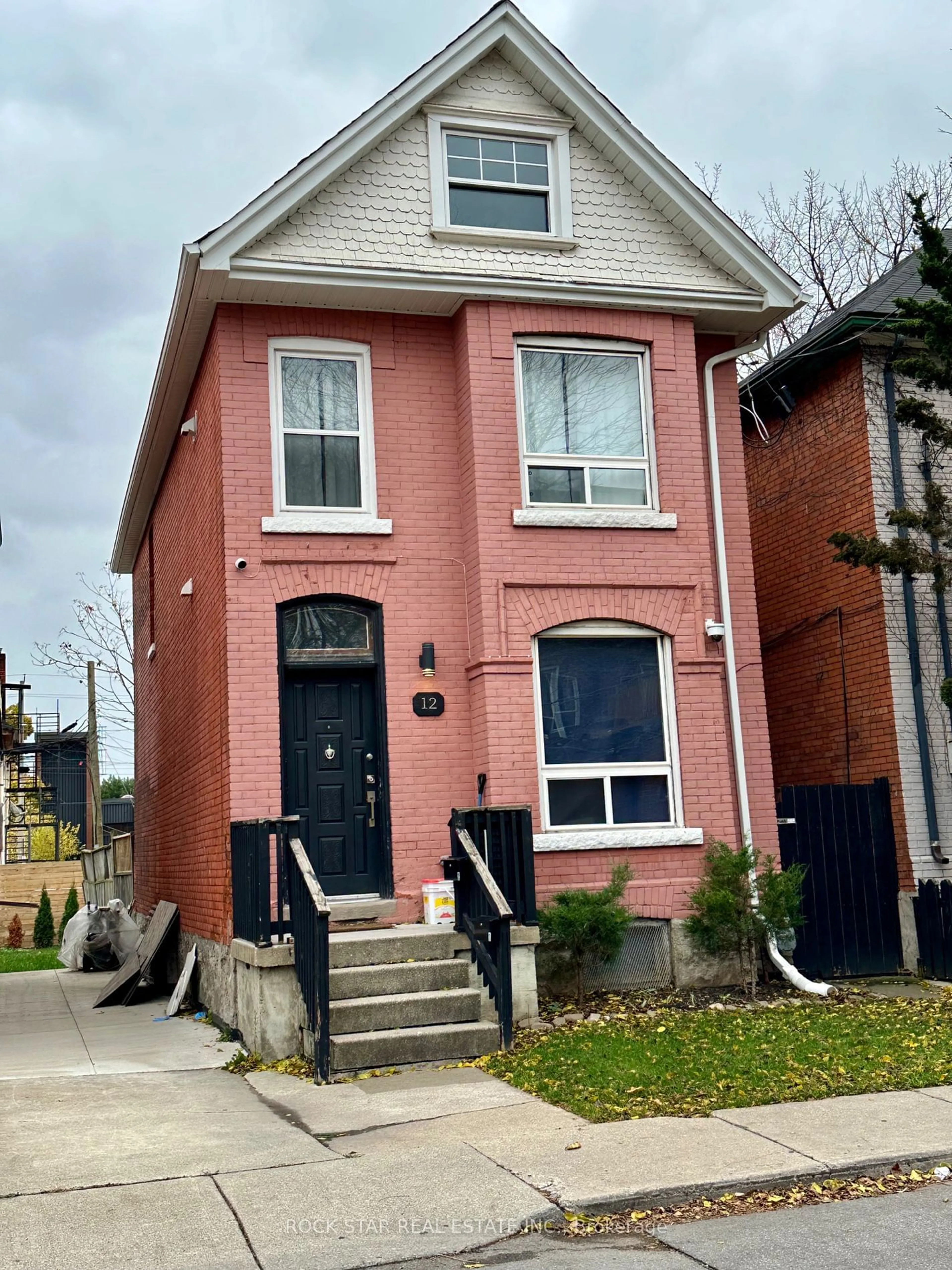 Home with brick exterior material, street for 12 William St, Hamilton Ontario L8L 5T7