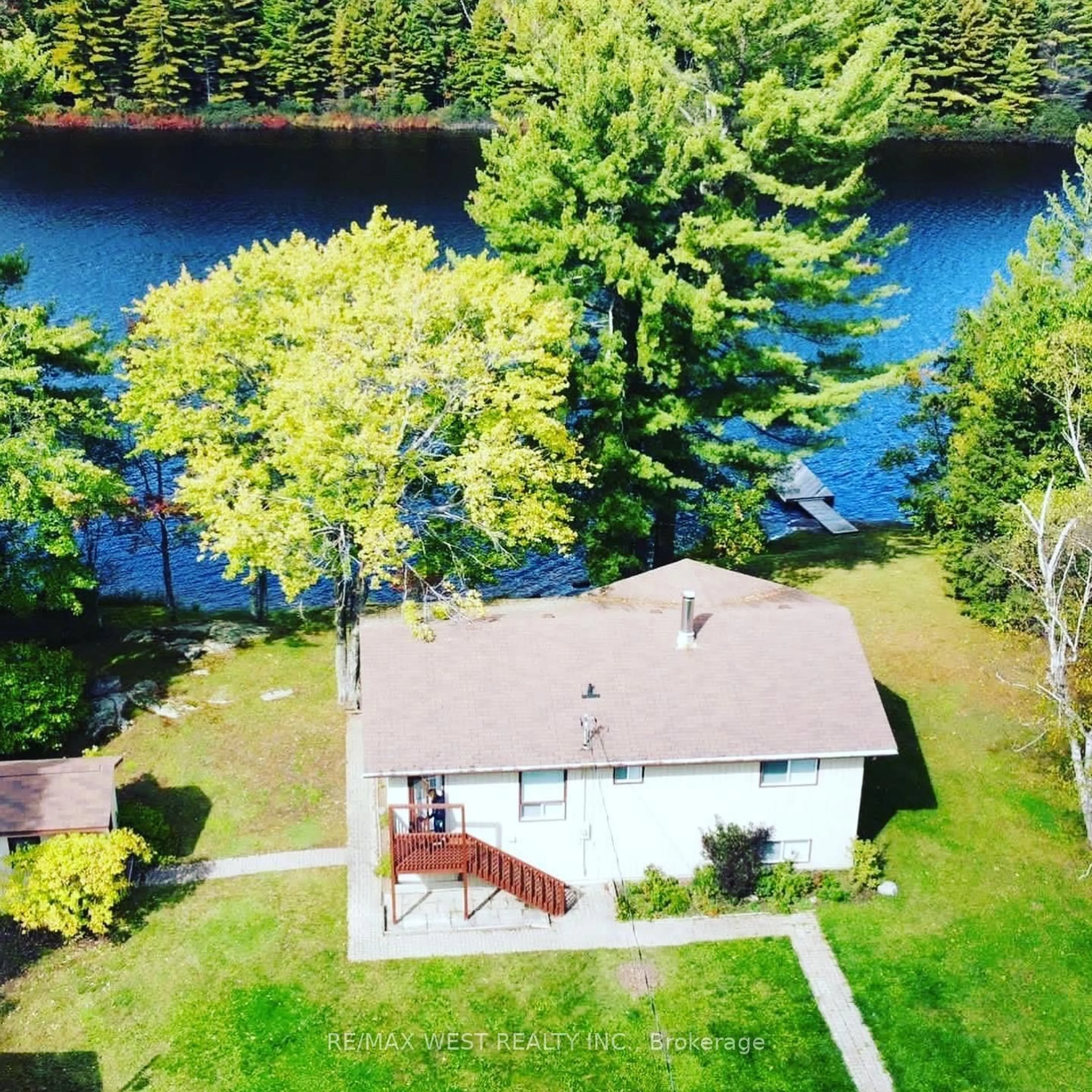 A pic from outside/outdoor area/front of a property/back of a property/a pic from drone, water/lake/river/ocean view for 135 Hwy 559, Carling Ontario P0G 1G0