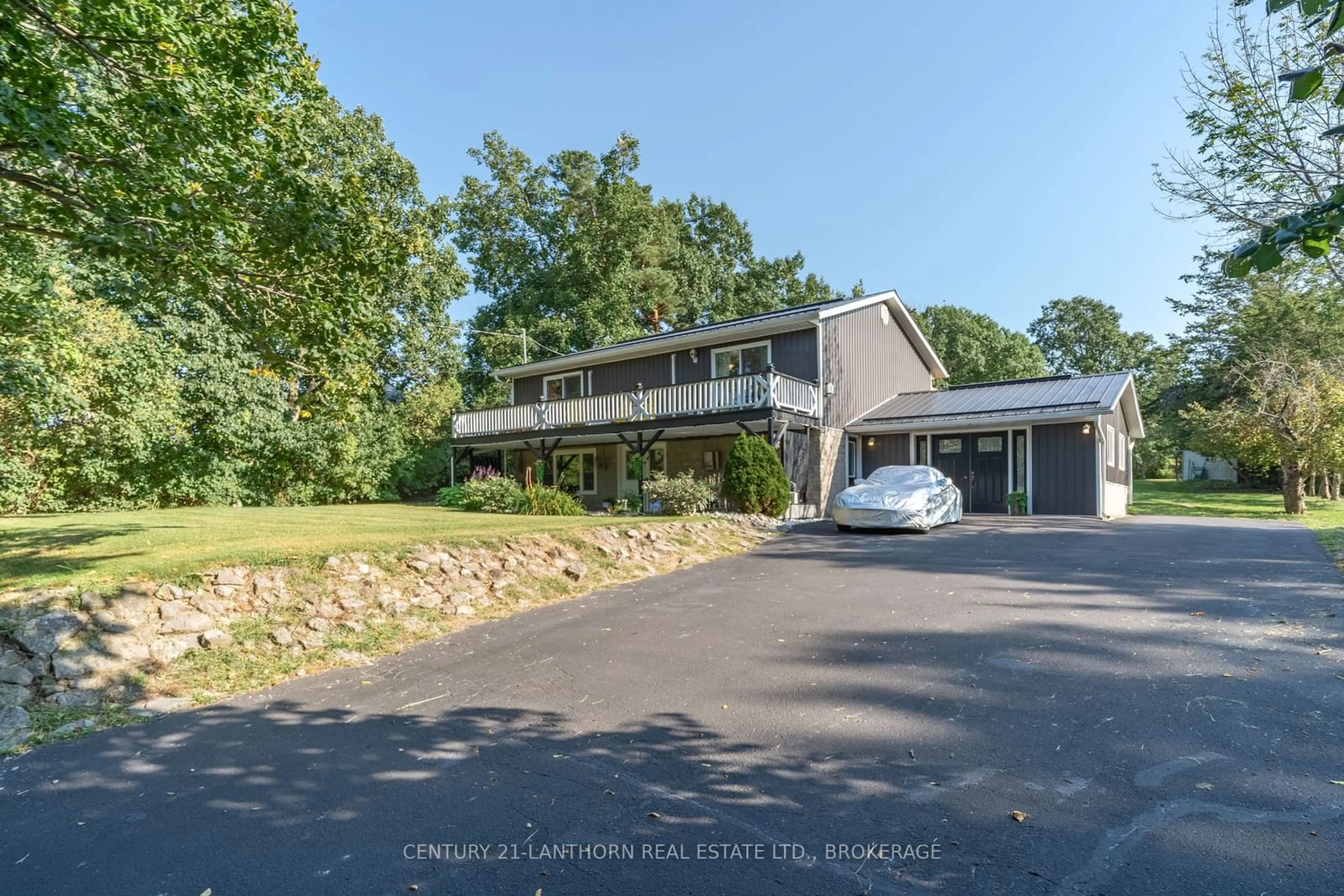 A pic from outside/outdoor area/front of a property/back of a property/a pic from drone, water/lake/river/ocean view for 11807 LOYALIST Pkwy, Prince Edward County Ontario K0K 2T0