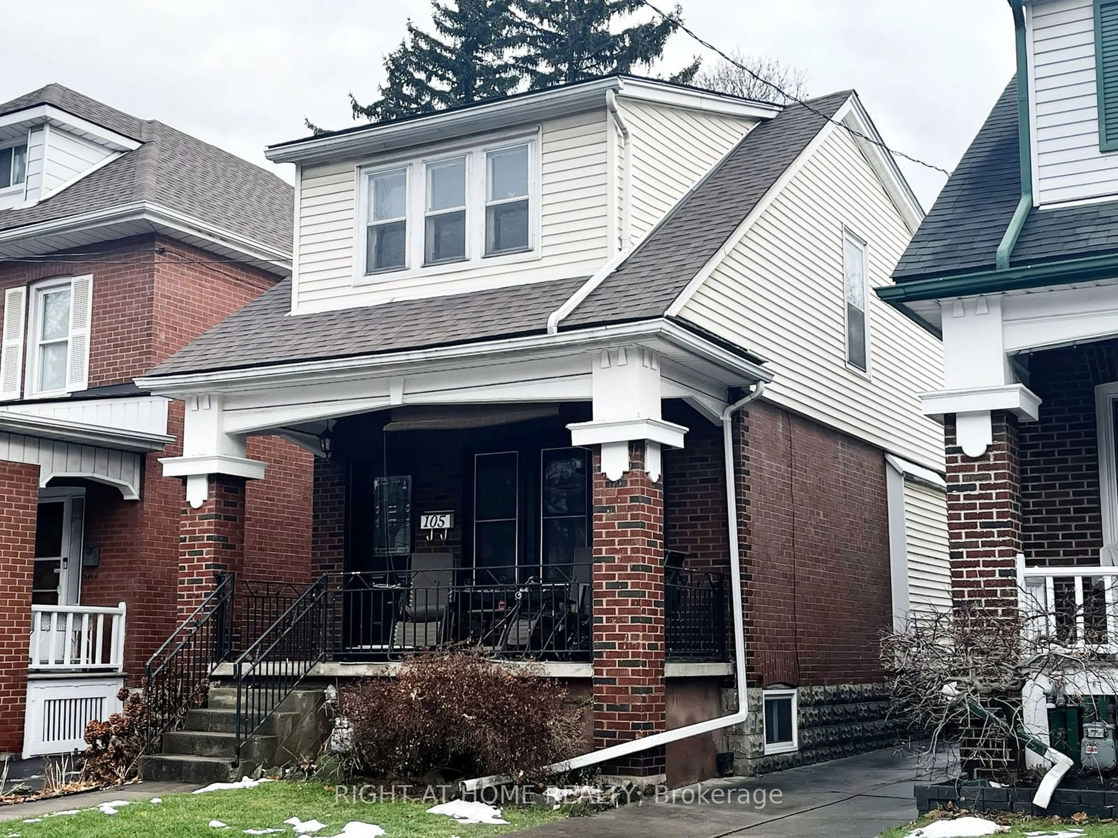 Home with brick exterior material, street for 105 Rothsay Ave, Hamilton Ontario L8M 3G3