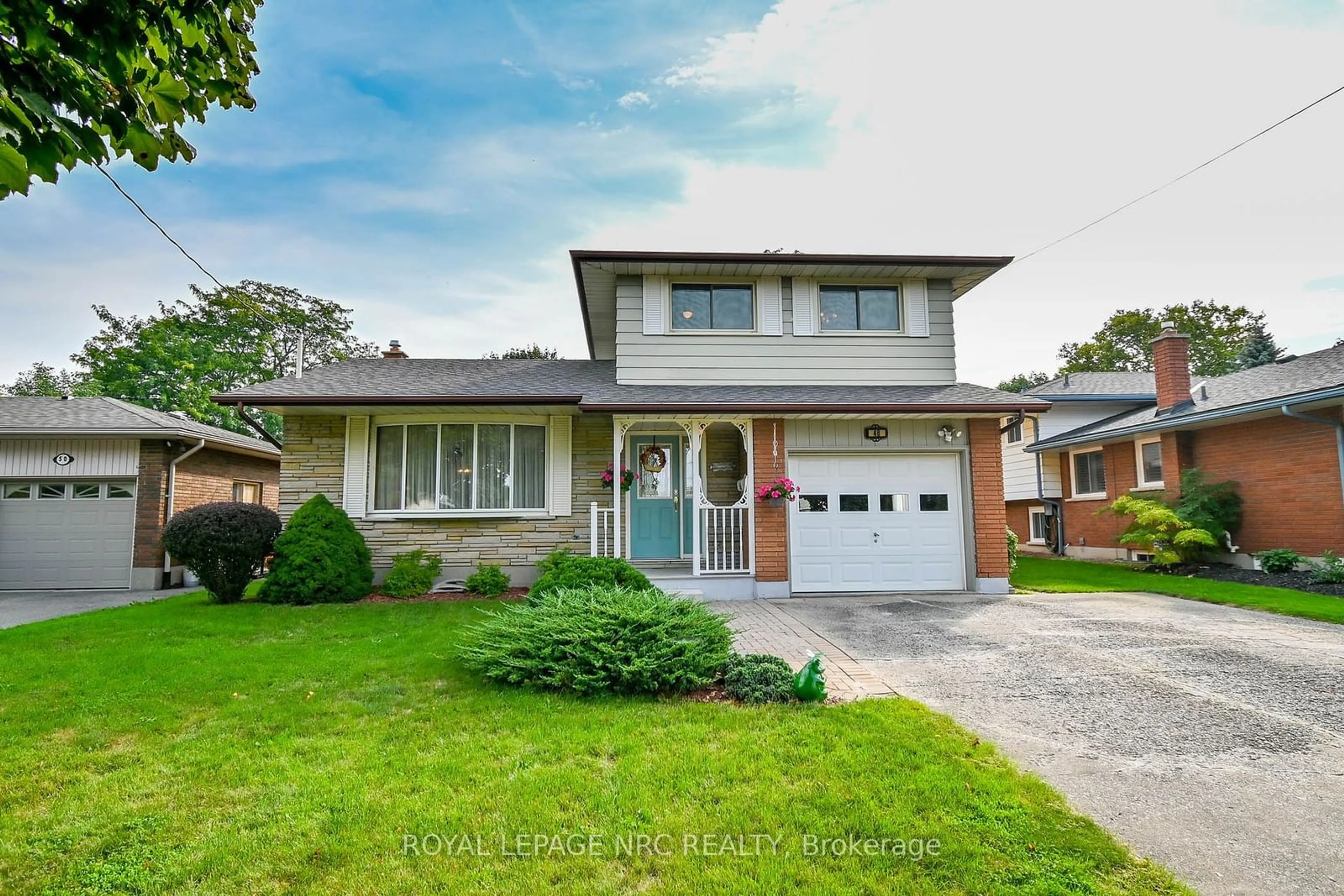 Home with brick exterior material, street for 48 Prince Charles Dr, St. Catharines Ontario L2N 3Y9