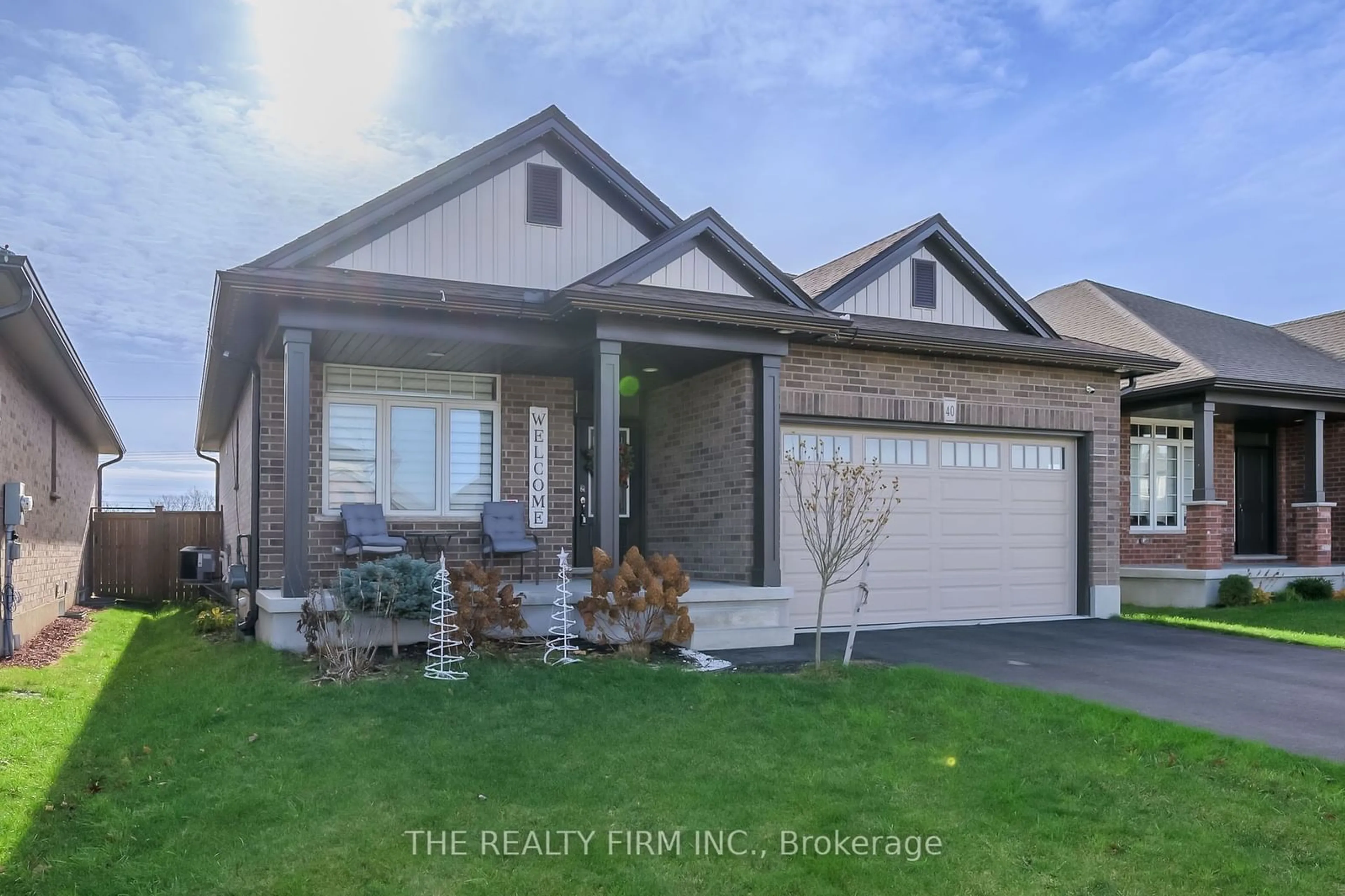 Home with vinyl exterior material, street for 40 Freeman Lane, Central Elgin Ontario N5P 0E4