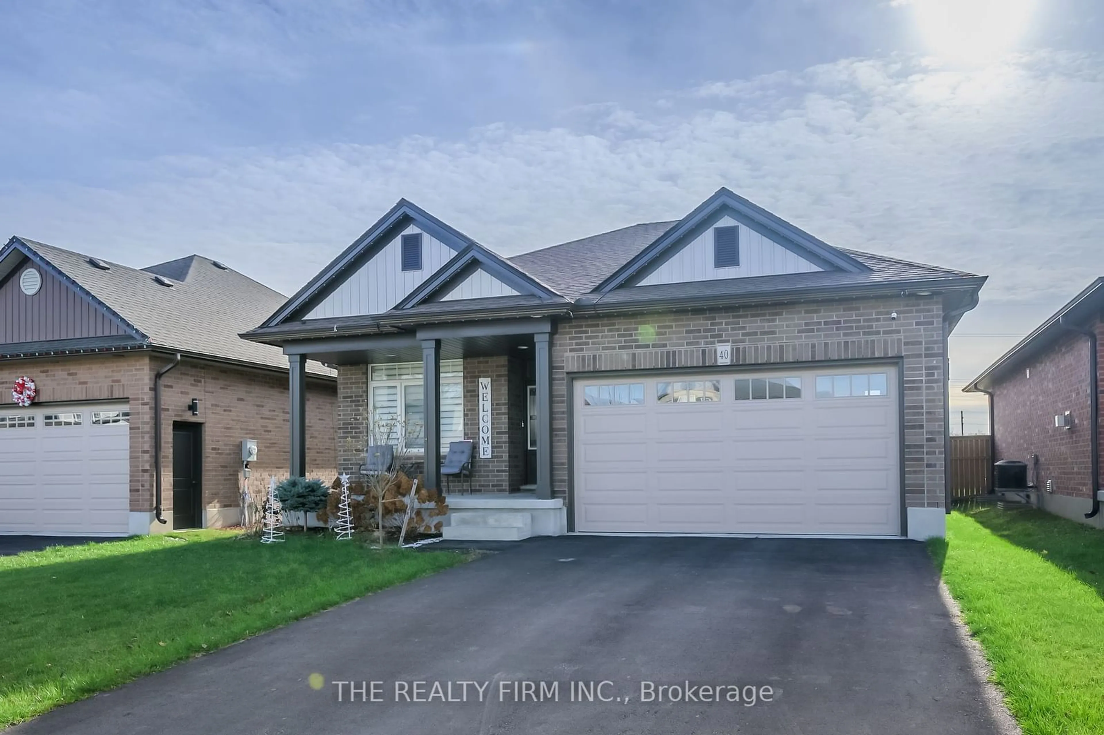 Home with brick exterior material, street for 40 Freeman Lane, Central Elgin Ontario N5P 0E4