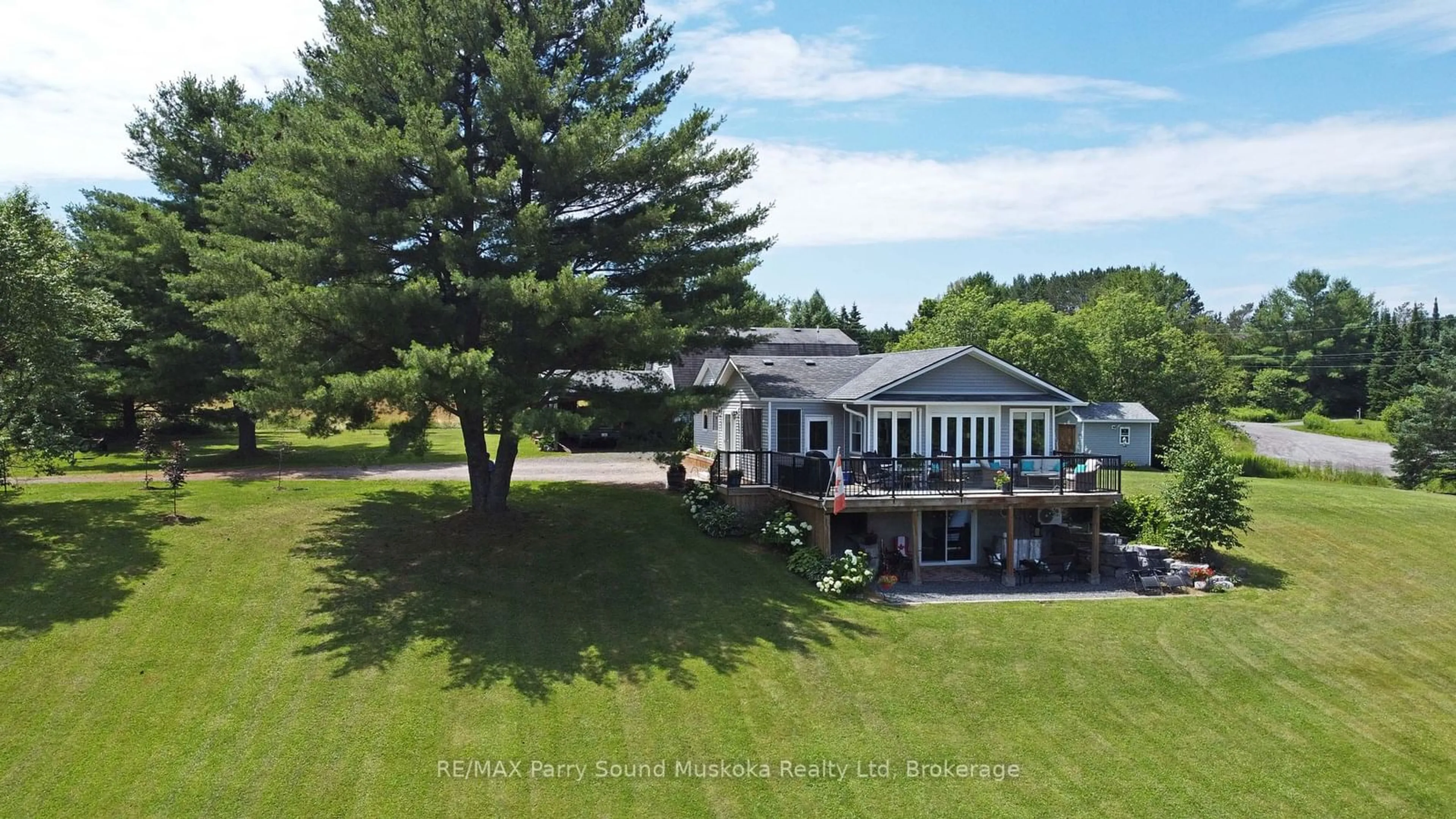 A pic from outside/outdoor area/front of a property/back of a property/a pic from drone, water/lake/river/ocean view for 126 Broadbent Rd, McKellar Ontario P2A 0B5