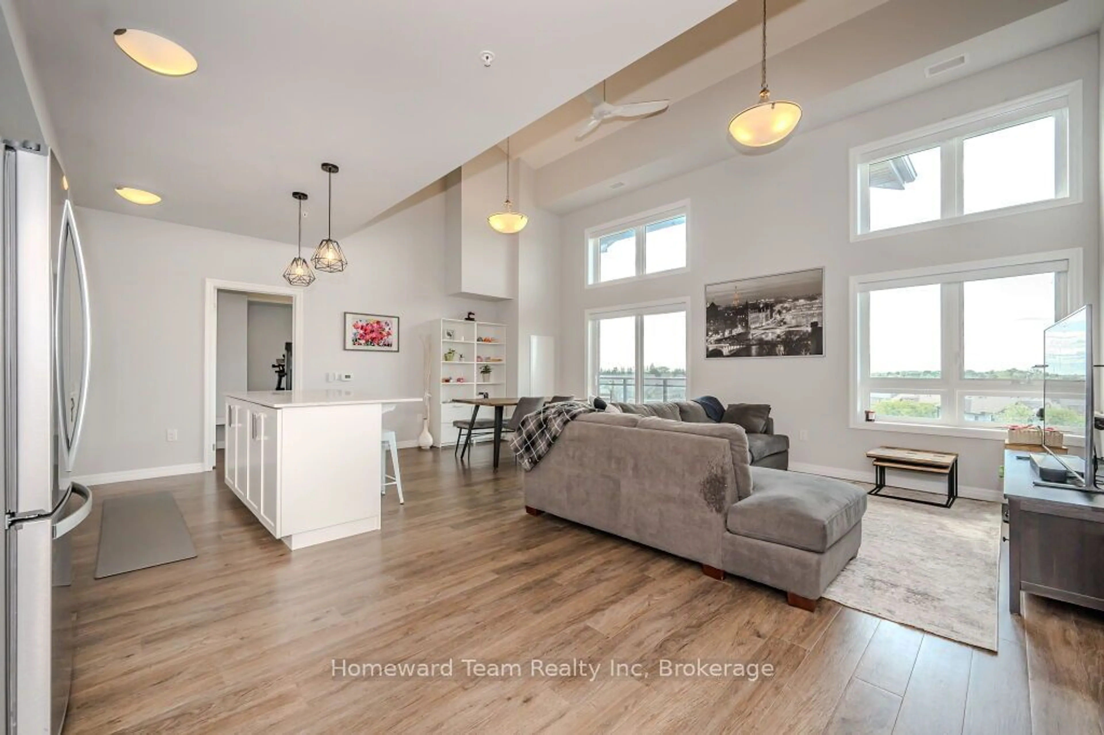 Open concept kitchen, wood/laminate floor for 35 KINGSBURY Sq #413, Guelph Ontario N1L 0J4