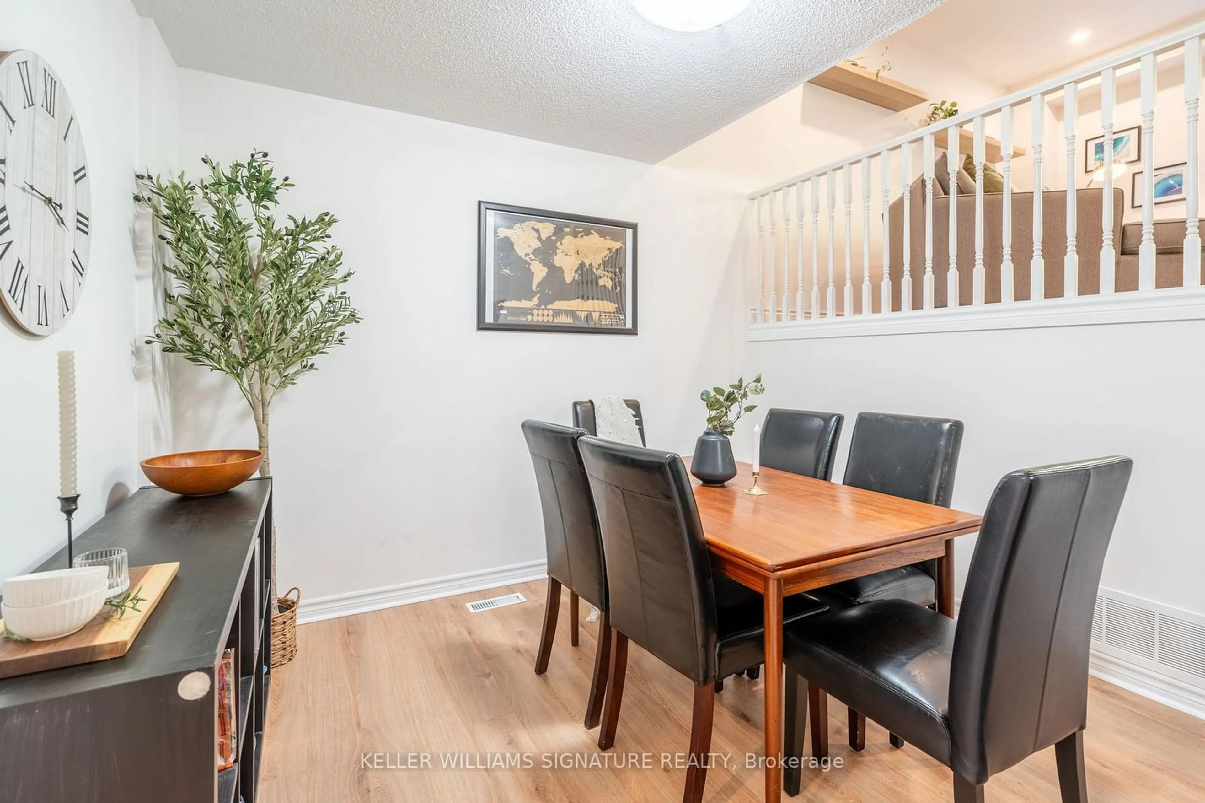 Dining room, wood/laminate floor for 11 Burdock Lane #29, Hamilton Ontario L9H 6E9