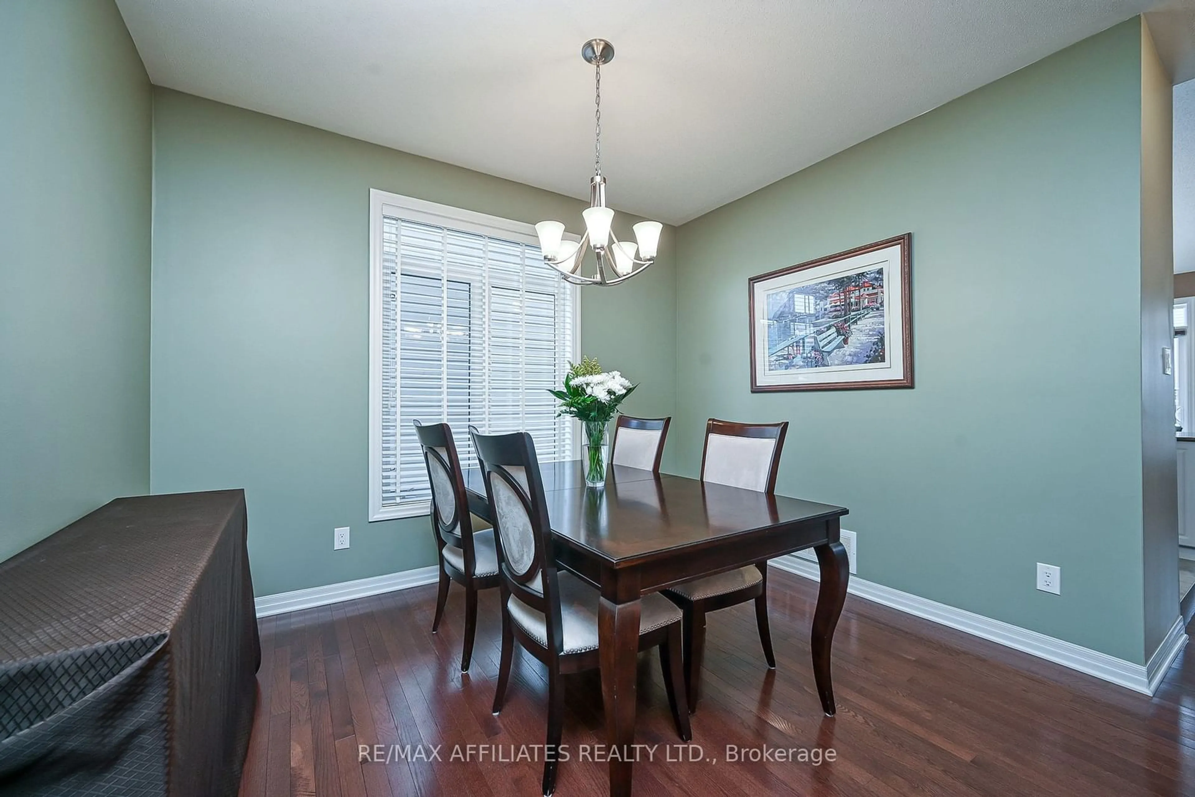 Dining room, wood/laminate floor for 951 Rotary Way, Leitrim Ontario K1T 0L2