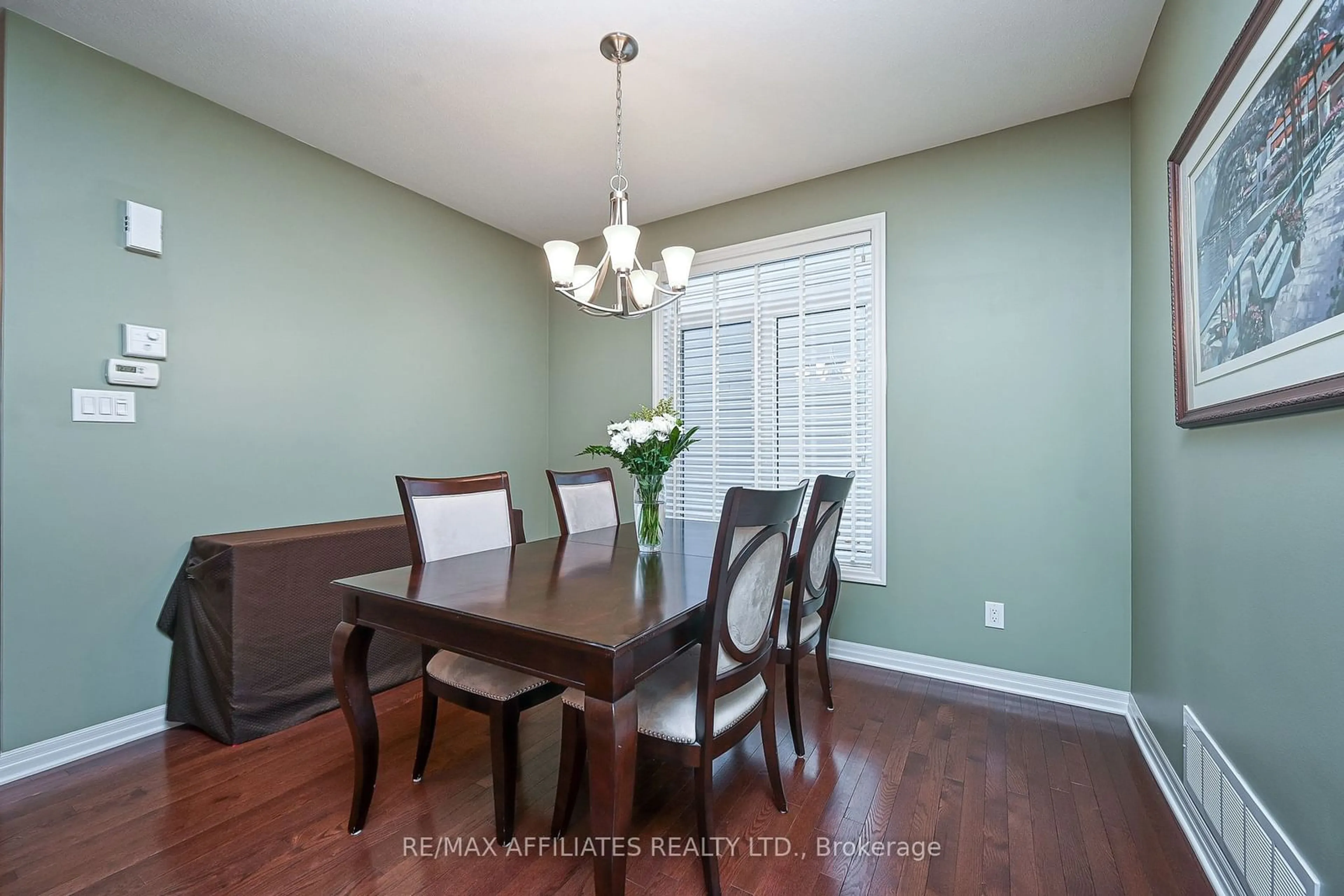 Dining room, wood/laminate floor for 951 Rotary Way, Leitrim Ontario K1T 0L2