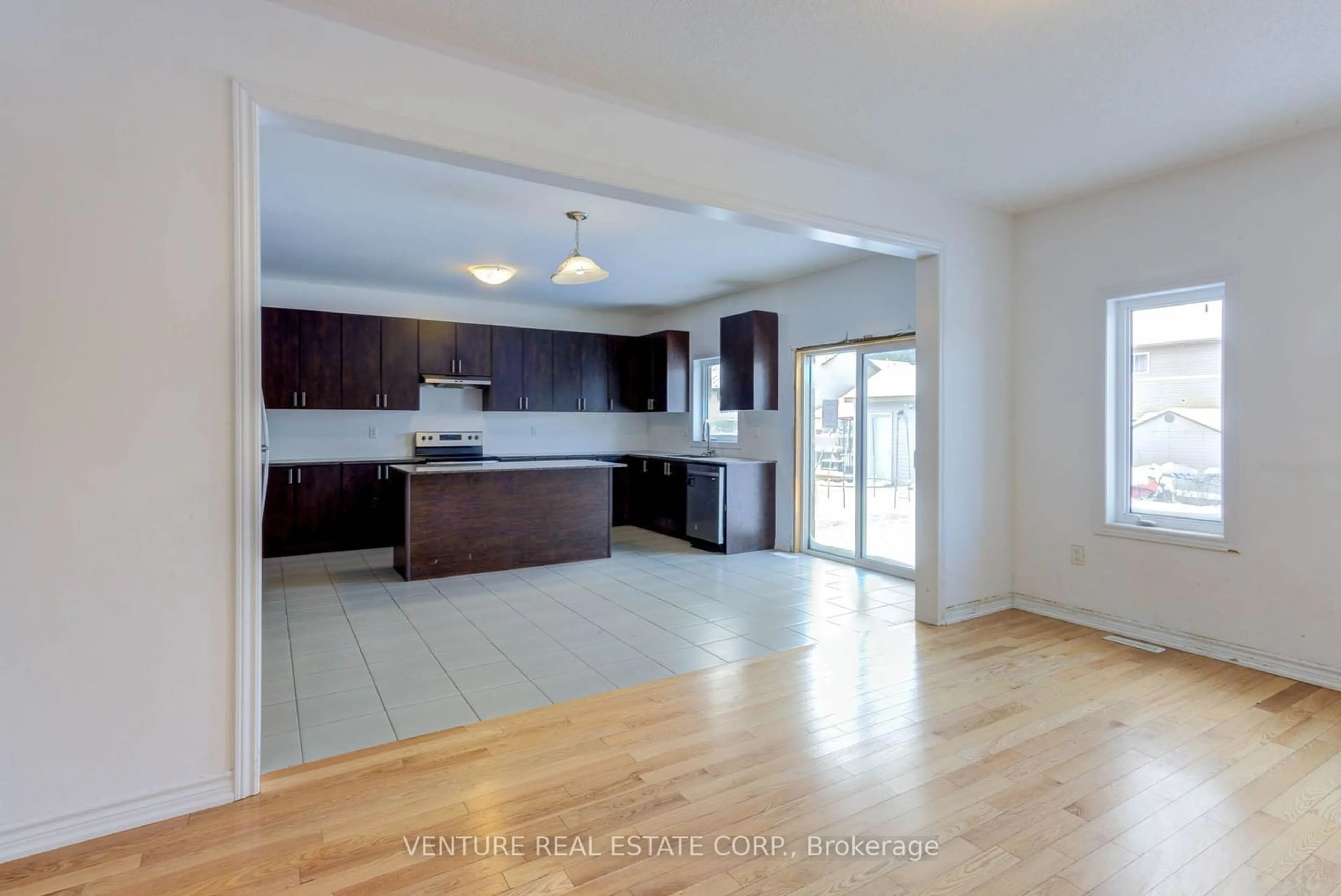 Open concept kitchen, wood/laminate floor for 251 Ridley Cres, Southgate Ontario N0C 1B8