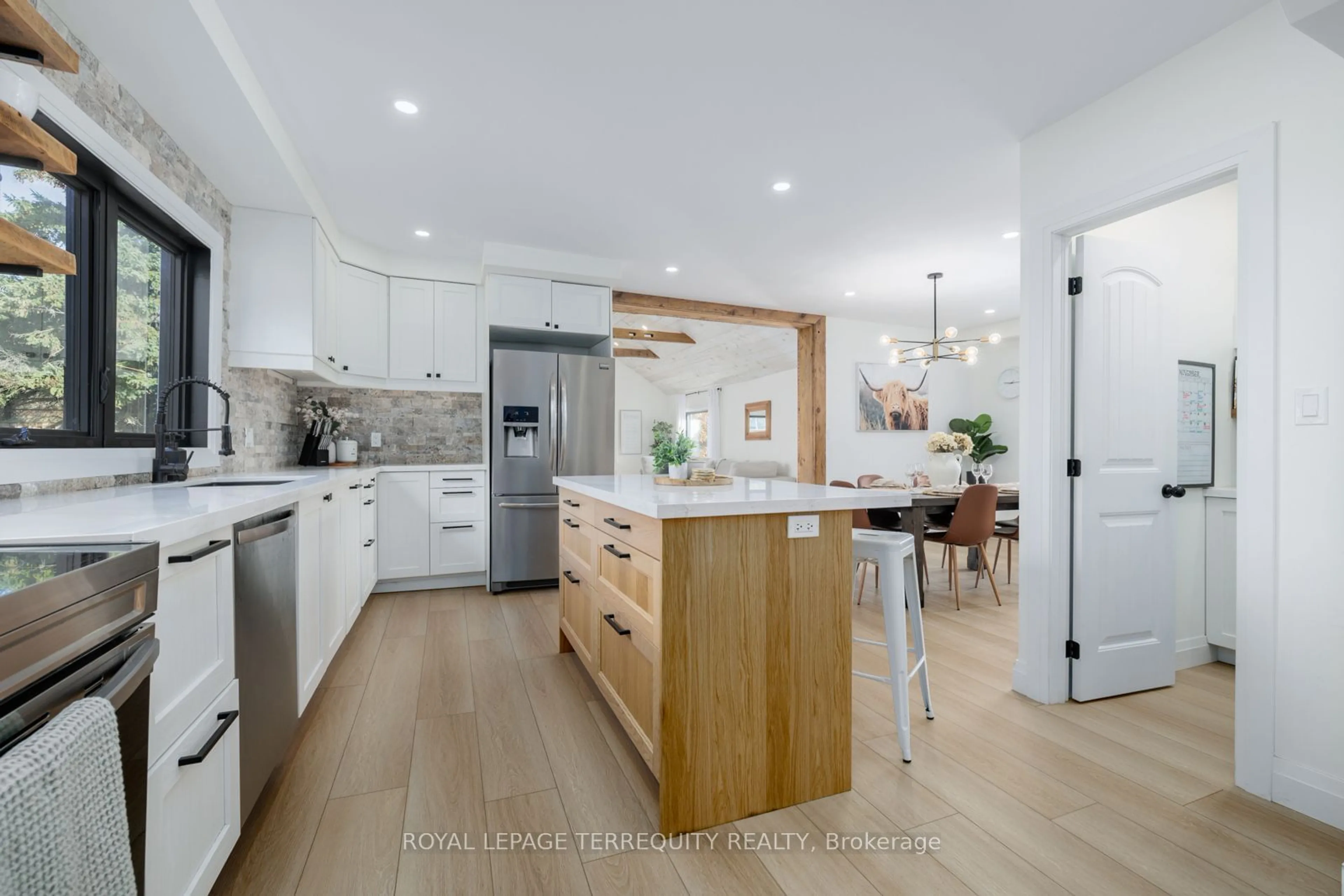 Contemporary kitchen, wood/laminate floor for 3455 Albert's Ally, Hamilton Township Ontario K9A 4J7