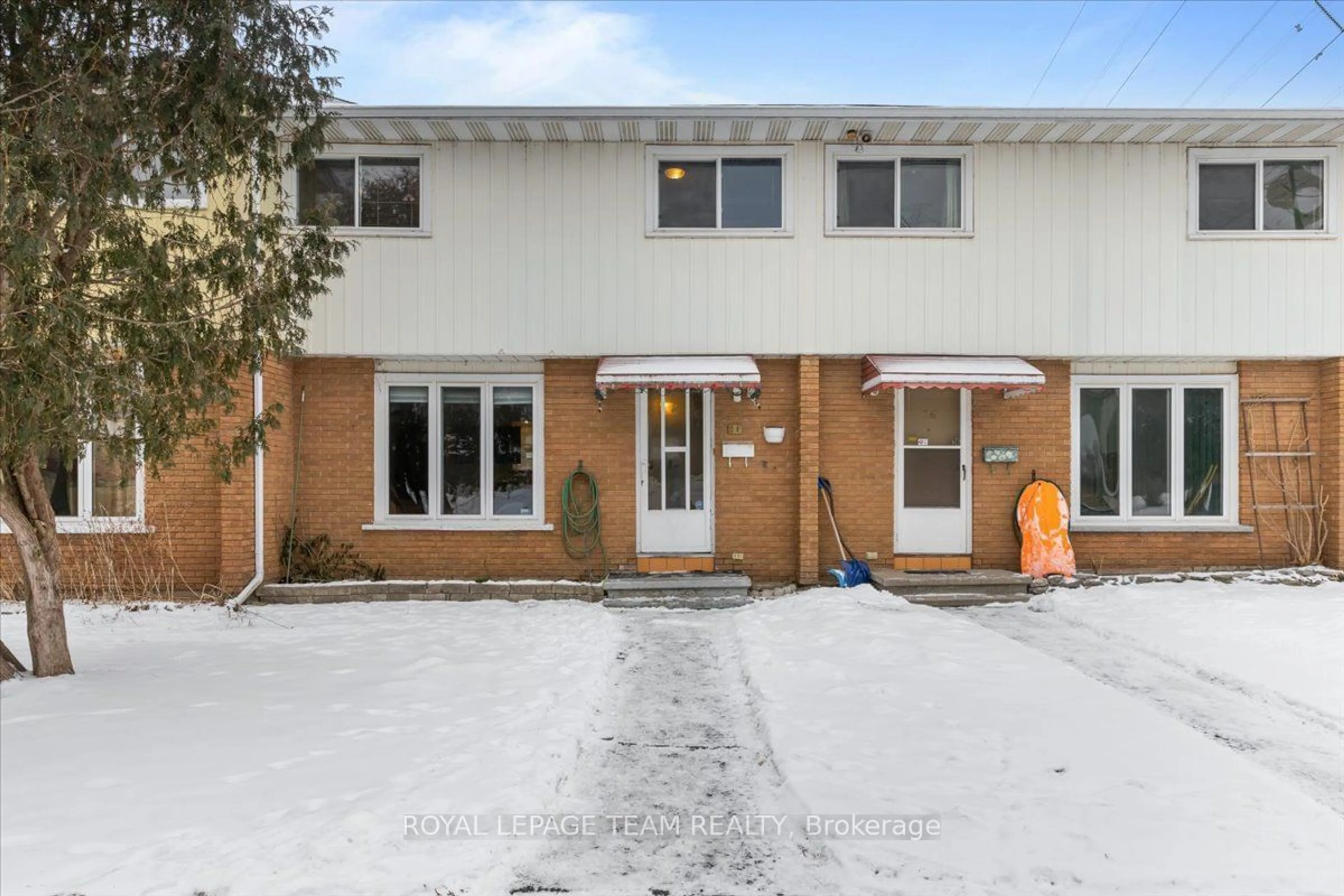 A pic from outside/outdoor area/front of a property/back of a property/a pic from drone, street for 1295 Ledbury Ave #34, Ottawa Ontario K1V 6W6