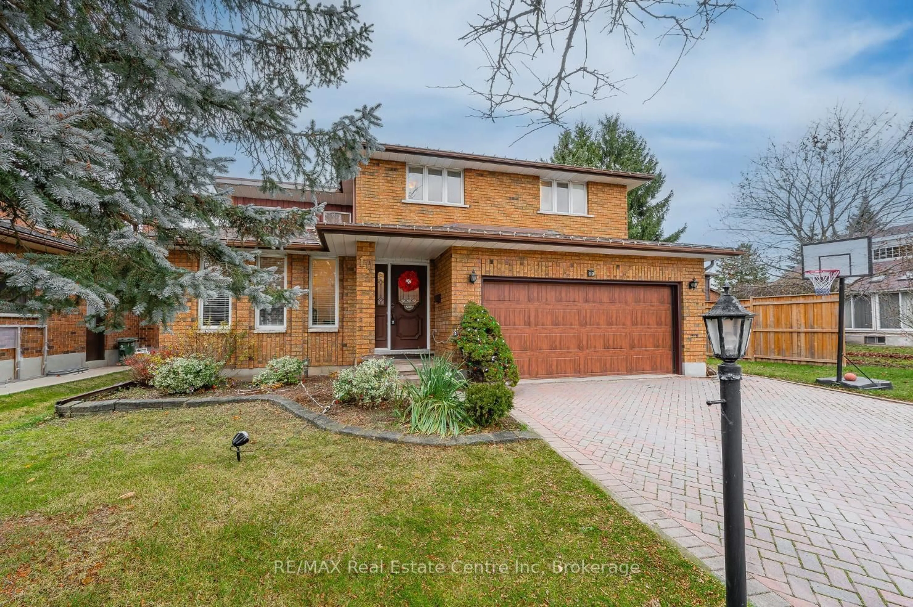 Home with brick exterior material, street for 10 Kortright Rd, Guelph Ontario N1G 4C9