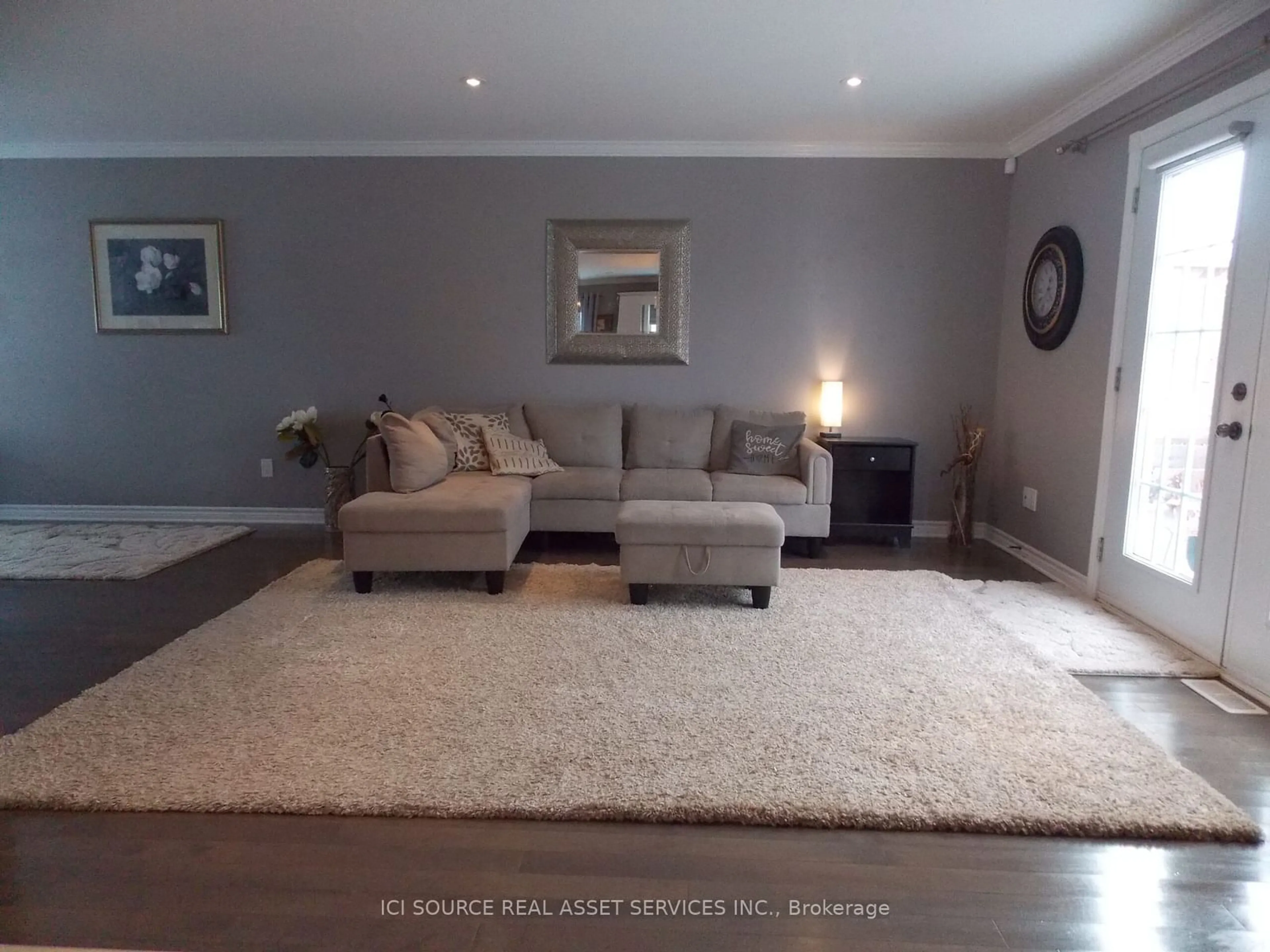 Living room with furniture, carpet floor for 856 Oceane St, The Nation Ontario K0A 2M0