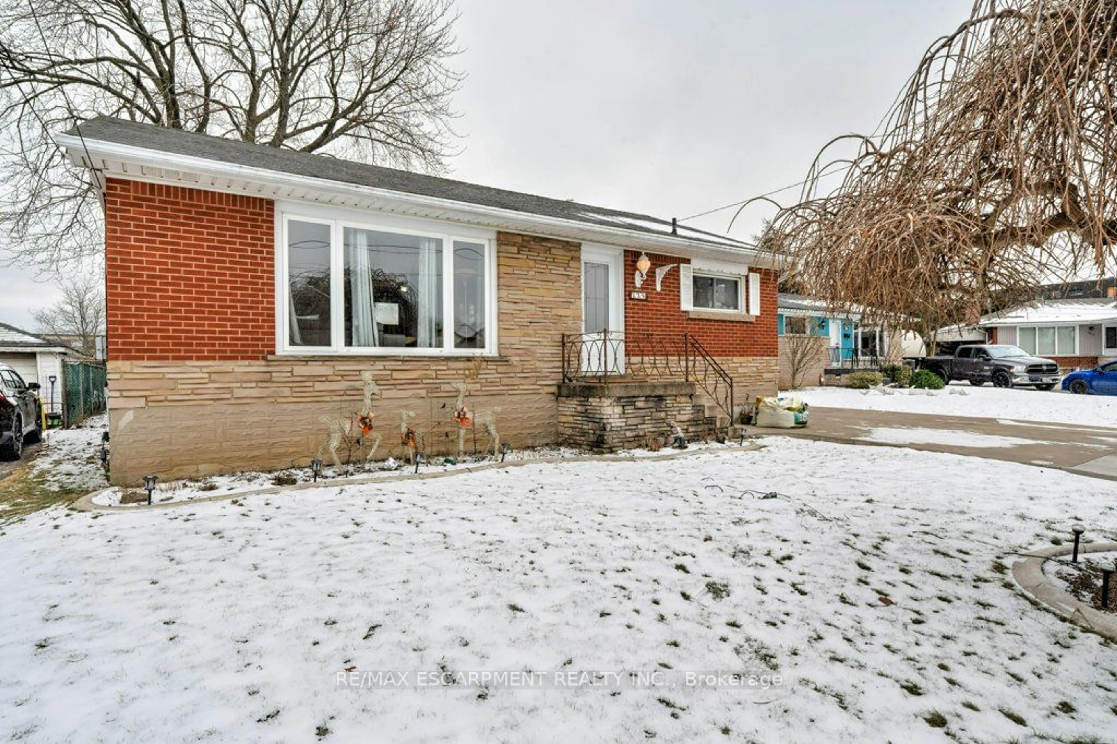 Home with brick exterior material, street for 139 West 3rd St, Hamilton Ontario L9C 3K6