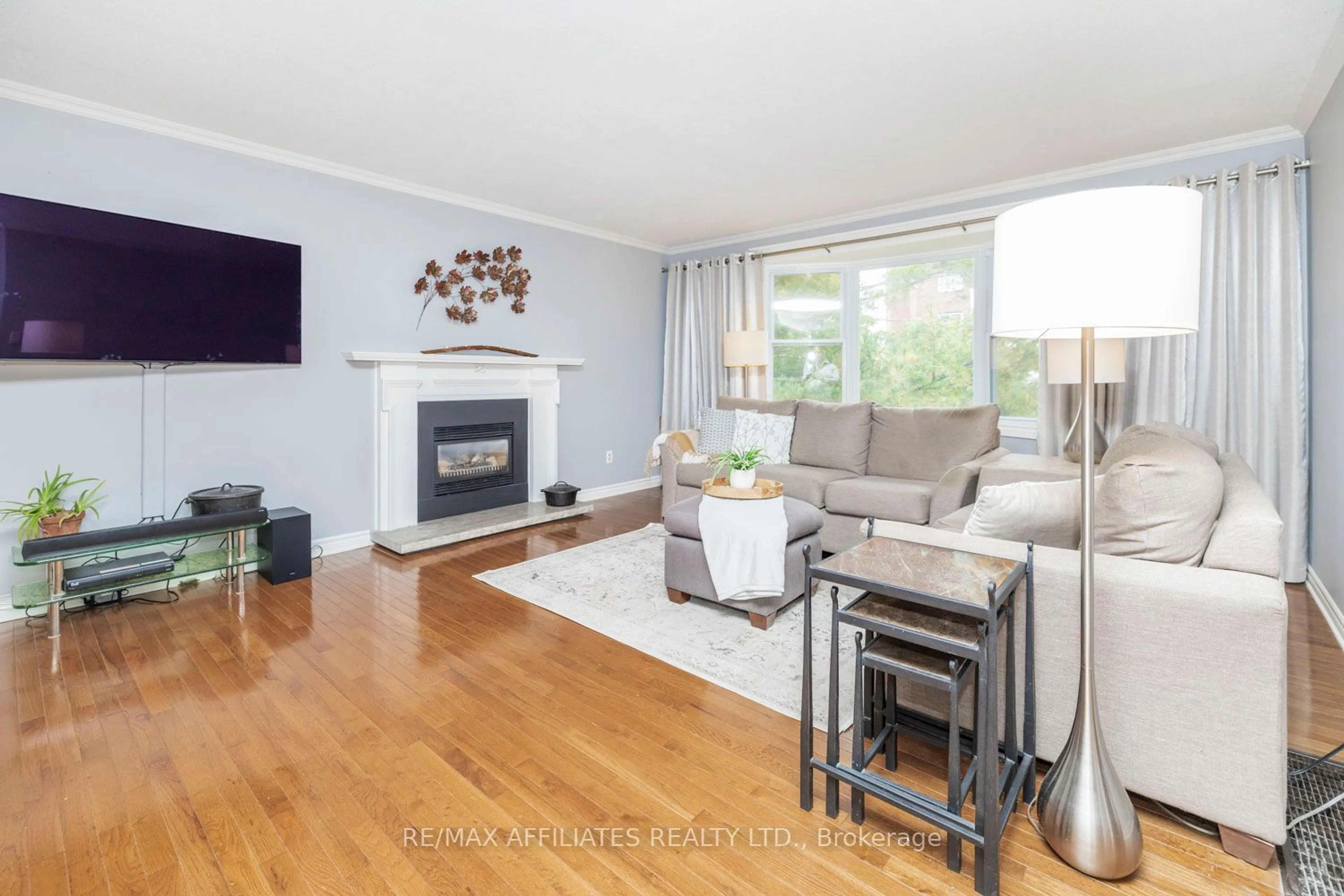 Living room with furniture, wood/laminate floor for 392 Country St, Mississippi Mills Ontario K0A 1A0