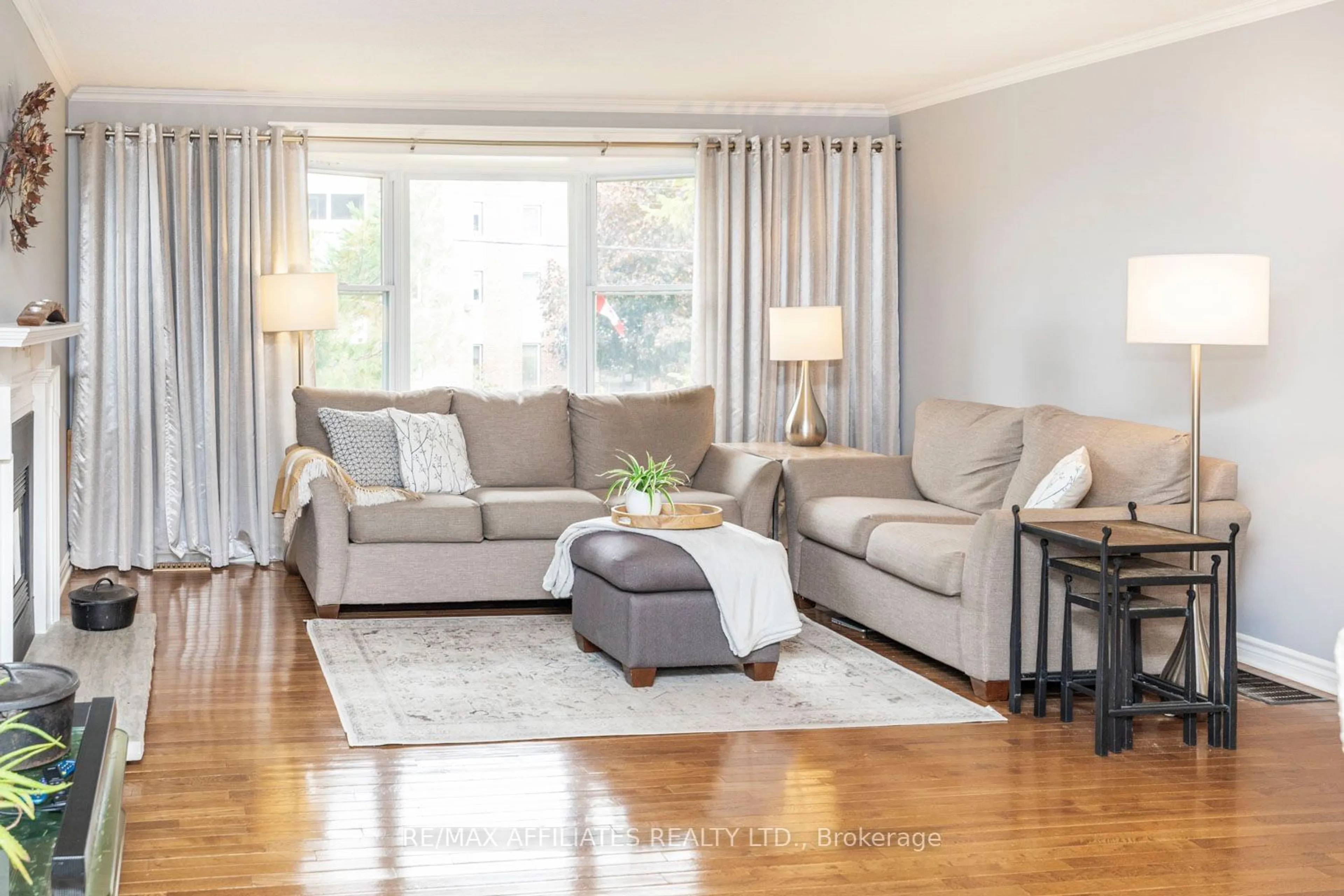 Living room with furniture, wood/laminate floor for 392 Country St, Mississippi Mills Ontario K0A 1A0